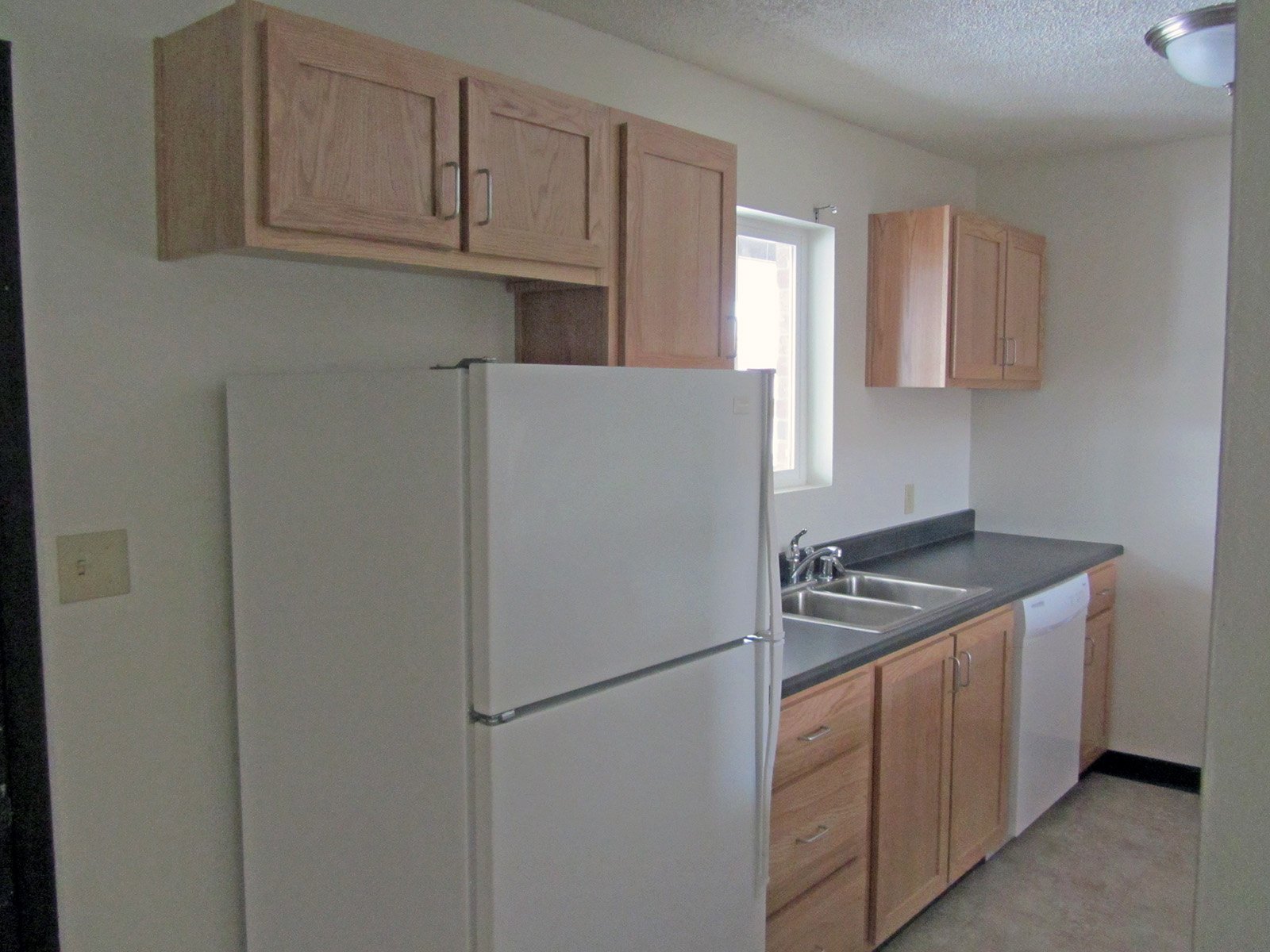 Kitchen inside Silver Bow Village home