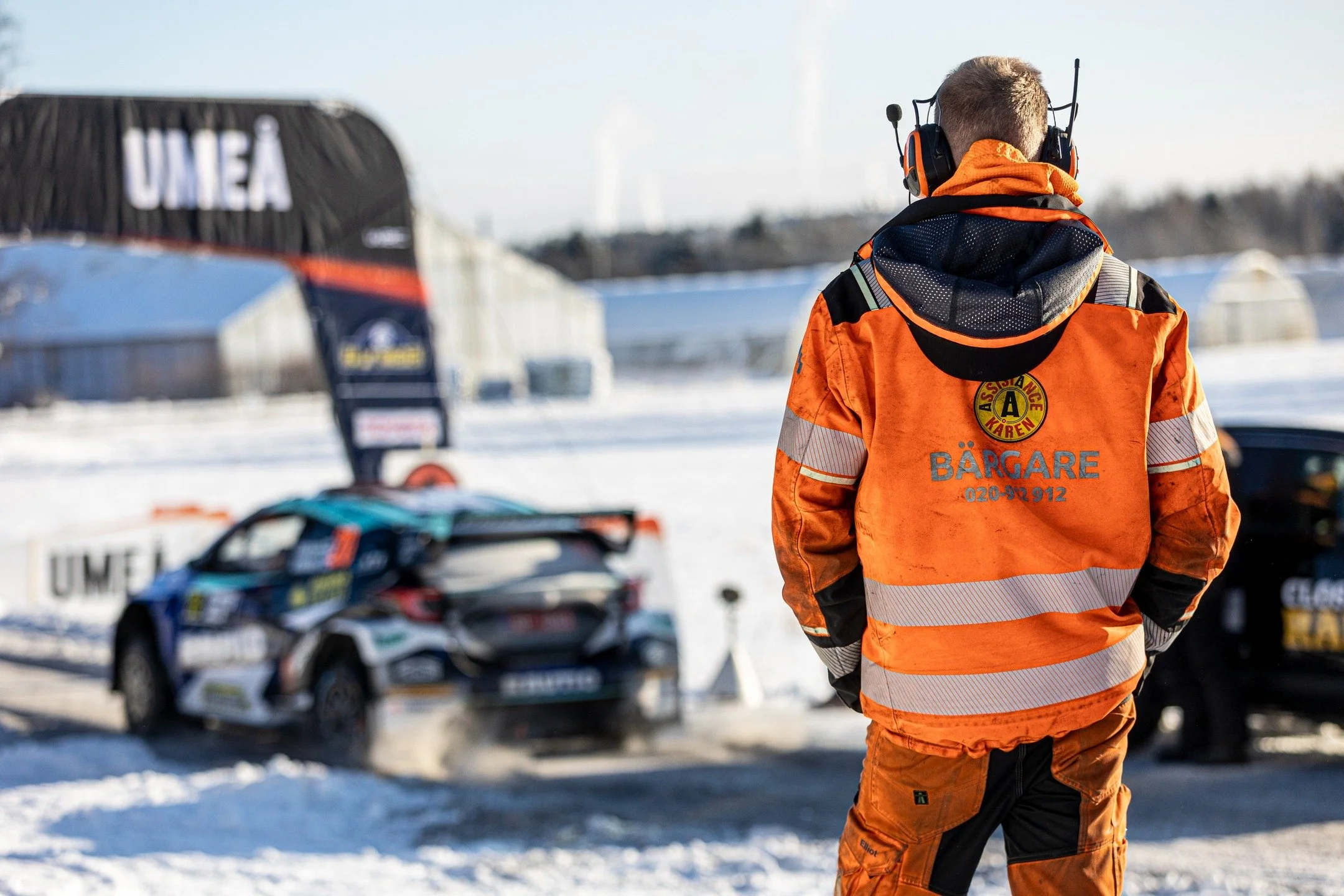 Part of the team that makes every kilometre possible.

Rescue personnel from Assistansk&aring;ren watching a car head into the stage at Rally Sweden 2026. 

📸 Marco Rimola
&copy;️ Pure WRC Agency
&copy;️ Marco Rimola Photography
⚠️ All rights reserv