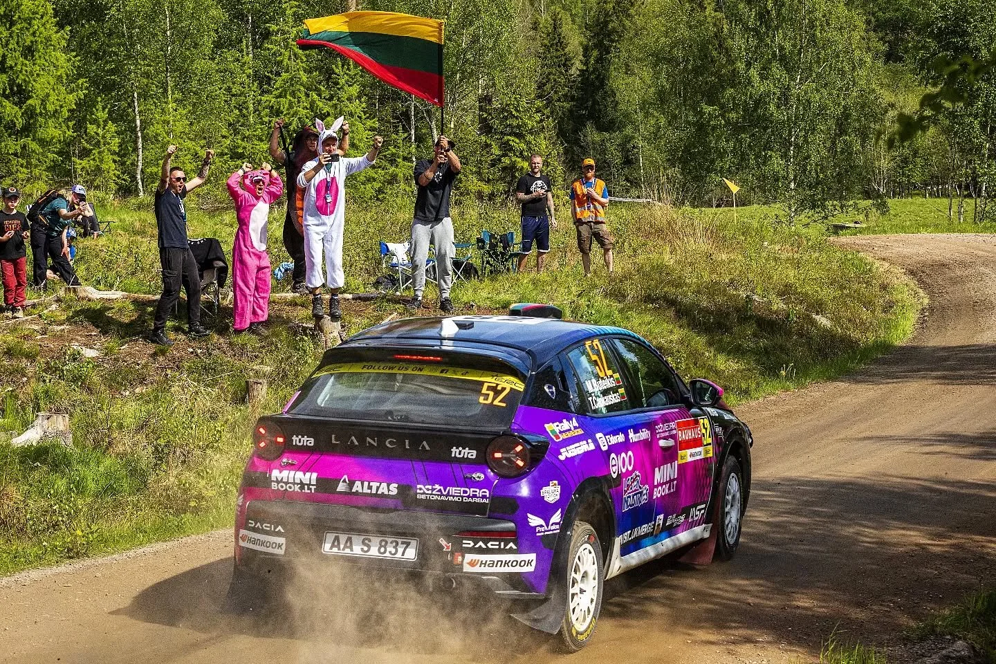 The kind of support every driver wants. 🇱🇹

Markas Buteikis and Titas Čapkauskas with the Lancia Ypsilon Rally4 passing in front of their Lithuanian supporters dressed for the occasion at ERC BAUHAUS Royal Rally Sweden.

📸 Marco Rimola
&copy;️ Pur