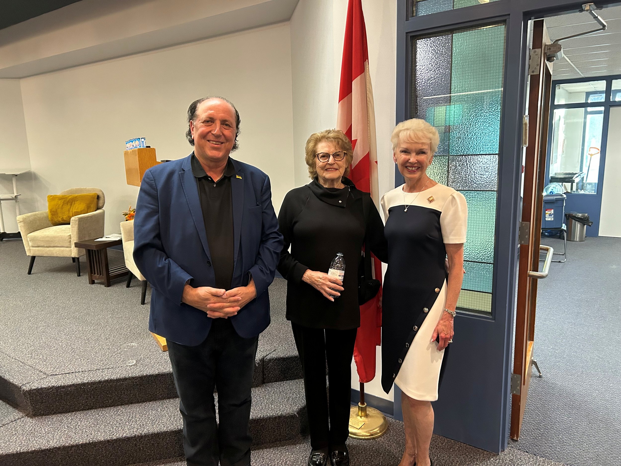 John, Mariette Rozen Doduck & LG McIntyre at Holocaust Survior presentation - May 24, 2026.jpg