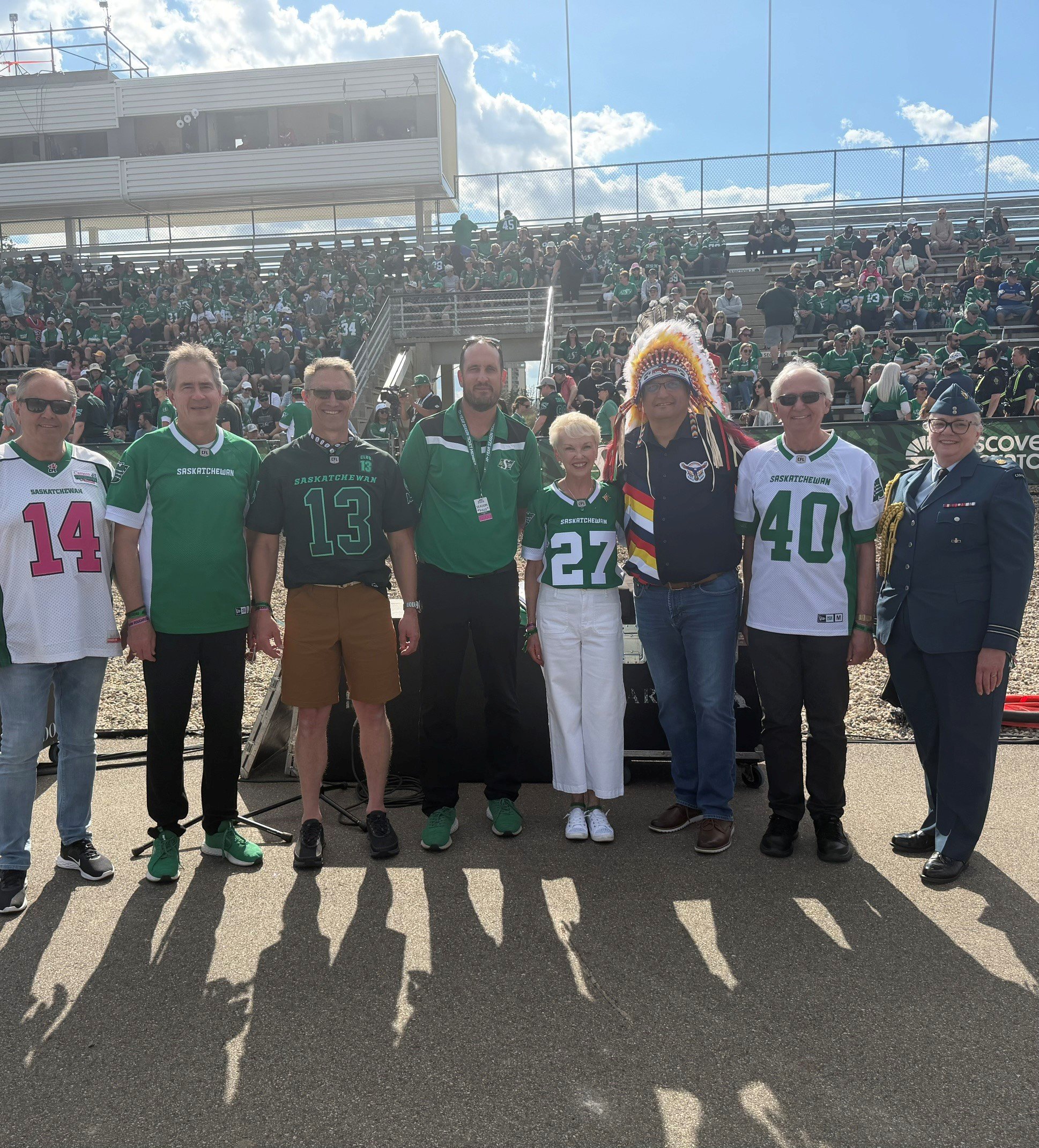 LG & Rich McIntyre, aide, Roughriders CEO before game - May 23, 2026.jpg