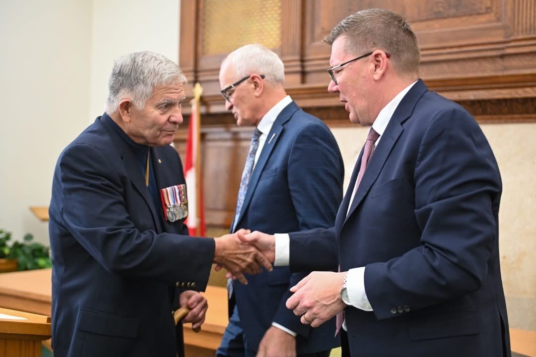 Cliff Walker shaking hands with Premier Moe - April 22, 2026.jpg