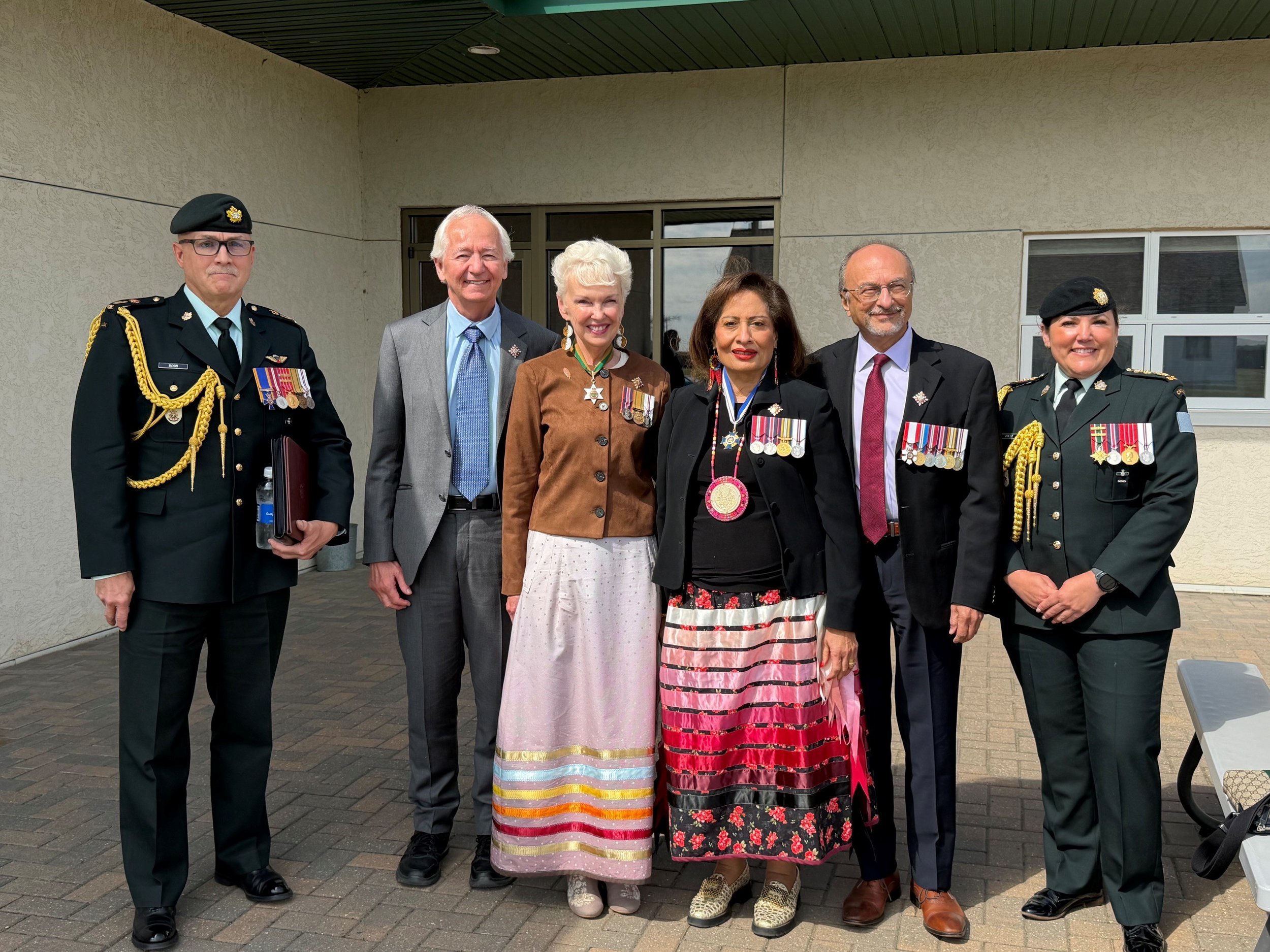 aides, McIntyres, LG Lakhani & spouse - June 20, 2026.jpg