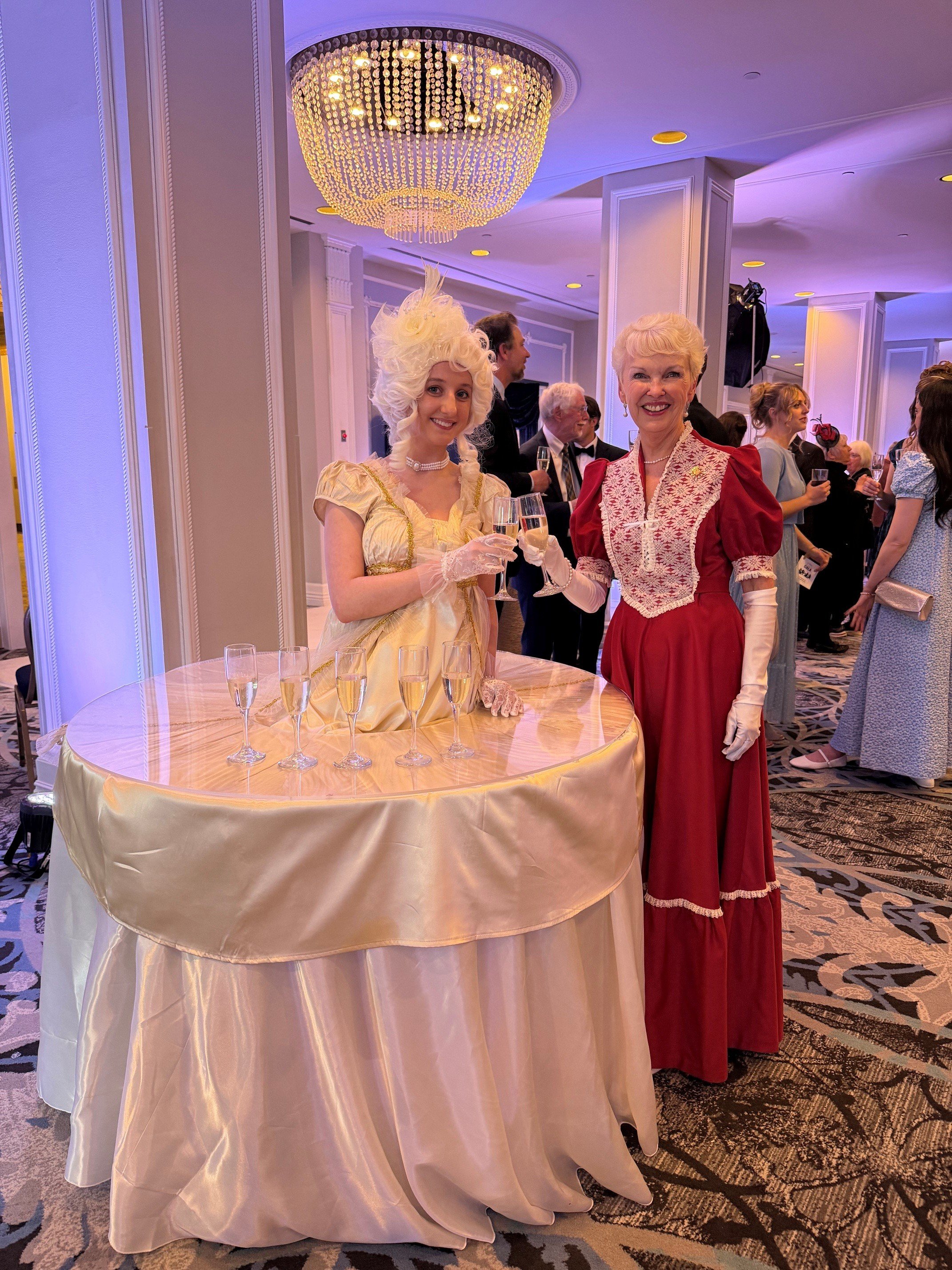 Girl with table for a dress & LG McIntyre at gala - May 22, 2026.jpg