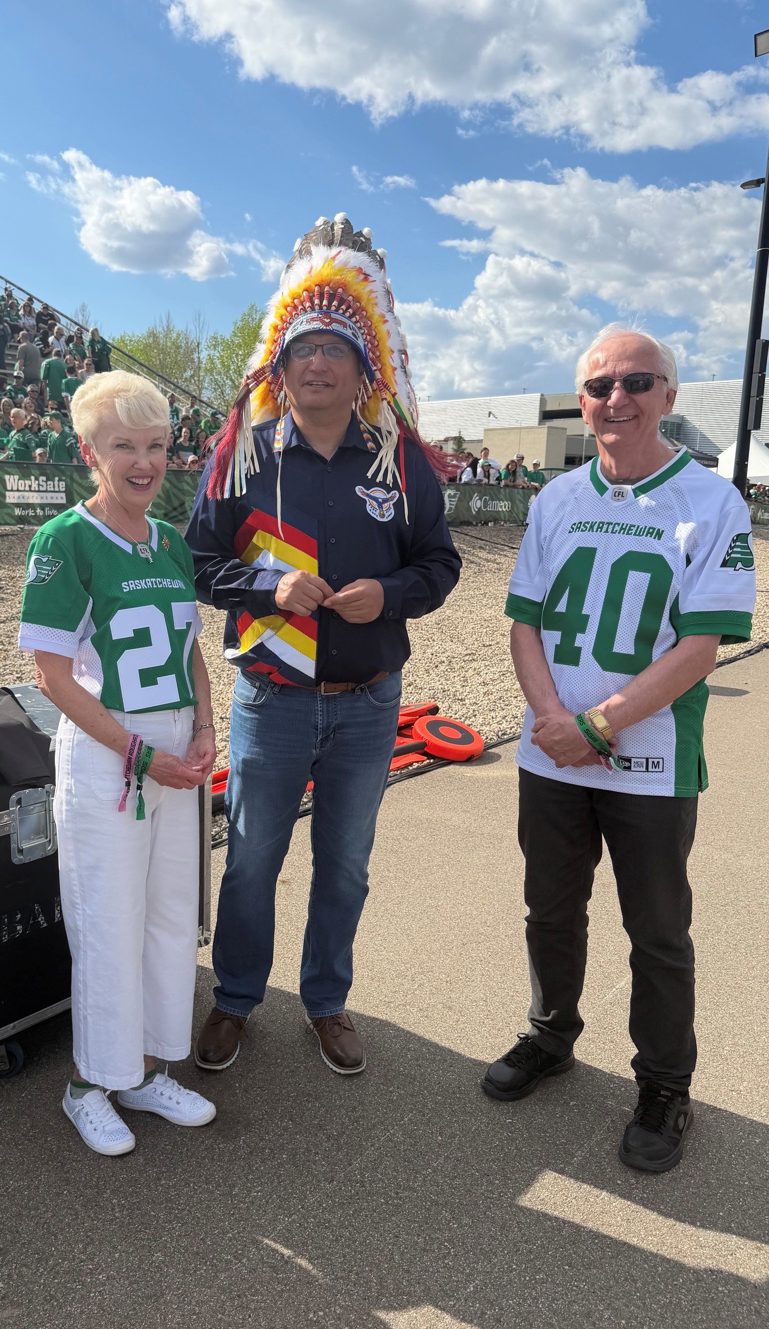 LG & Rich McIntyre with Chief at game - May 23, 2026.jpg