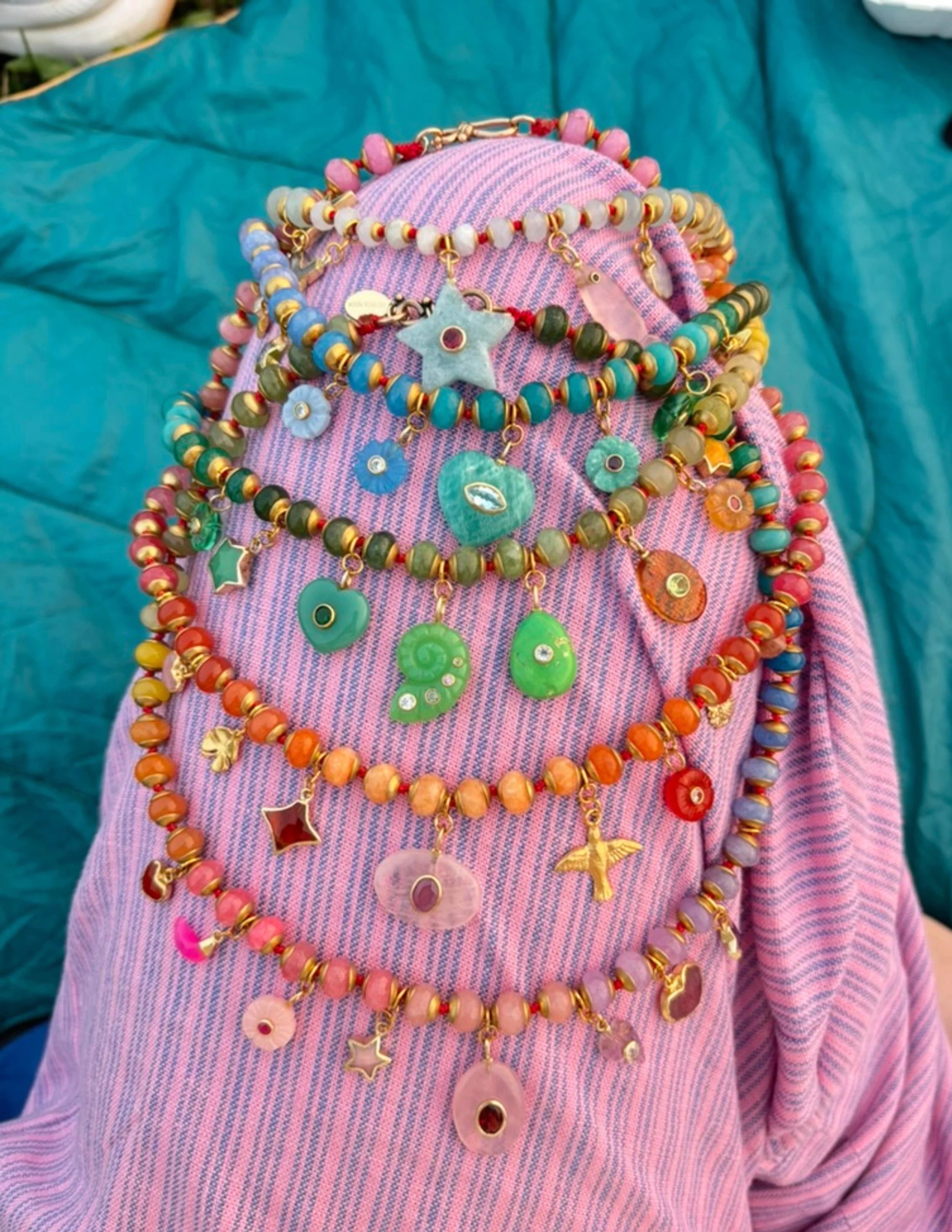 ostrich moon stack of necklaces jewelry.jpg