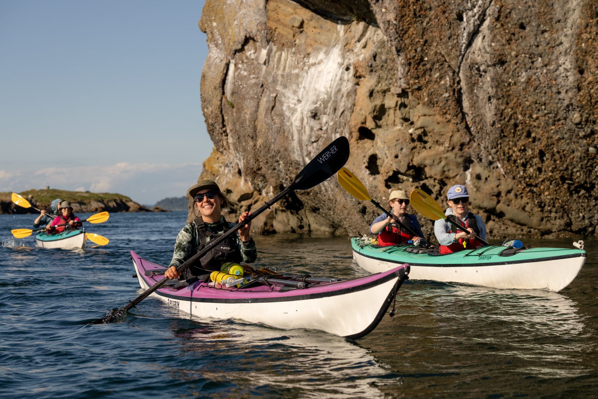Team paddling sea kayaks together in Bellingham for a corporate team-building activity