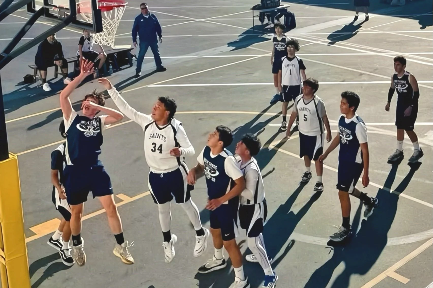 Student athletes on basketball team during game day