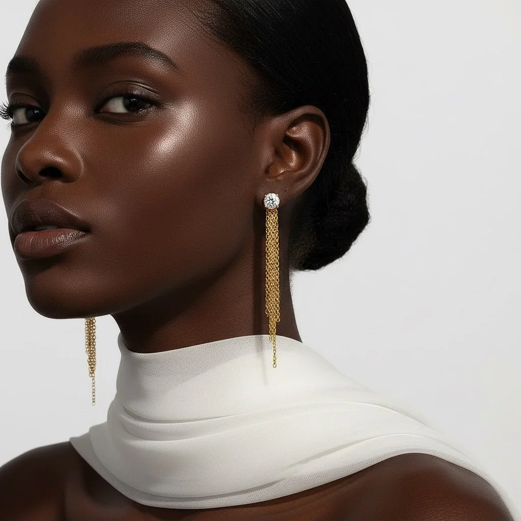 Luxe lines, liquid shine. Our long drop earrings are crafted in 925 sterling silver and finished with an 18K gold plate for that effortless glow&mdash;lightweight, hypoallergenic, and made to turn heads. Pair with a sleek bun and you&rsquo;re done. ✨