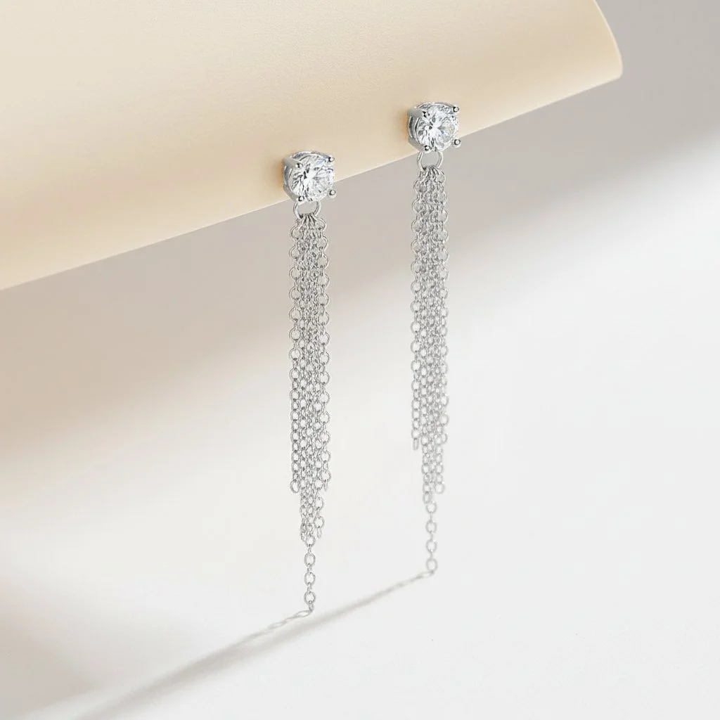 Luxury Sterling Silver Tassel Earrings Styled on Natural Travertine Stone