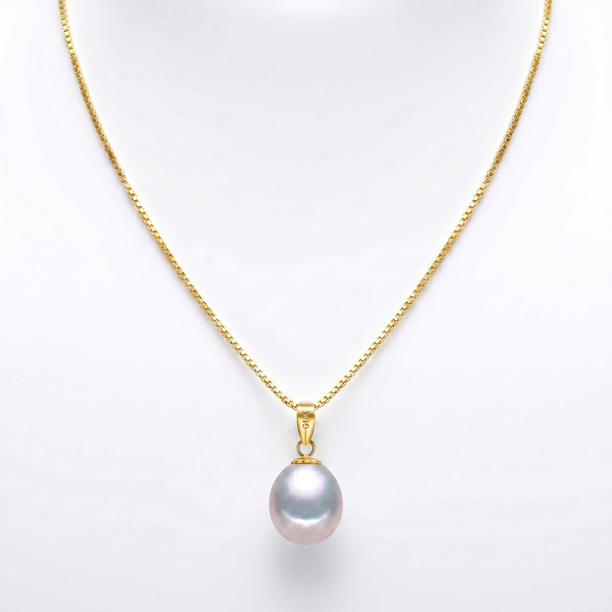 Timeless freshwater pearl pendant crafted in 925 sterling silver and finished with luxurious 18K gold plating.