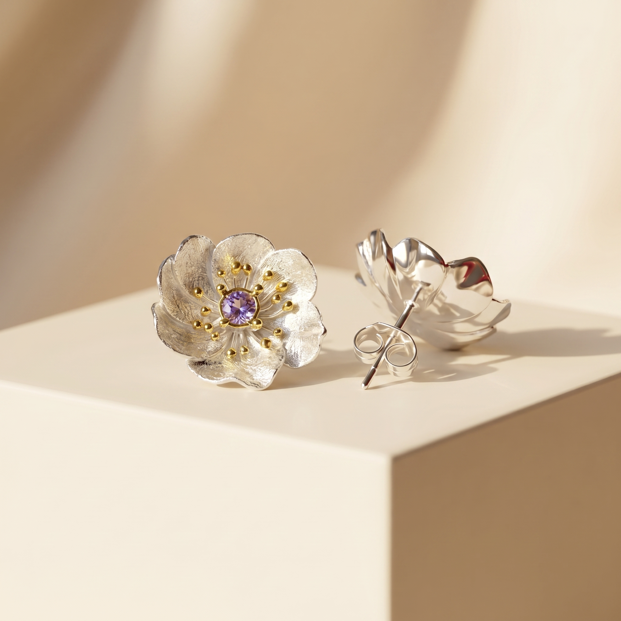 925 sterling silver flower earrings showing front floral design and secure stud backing