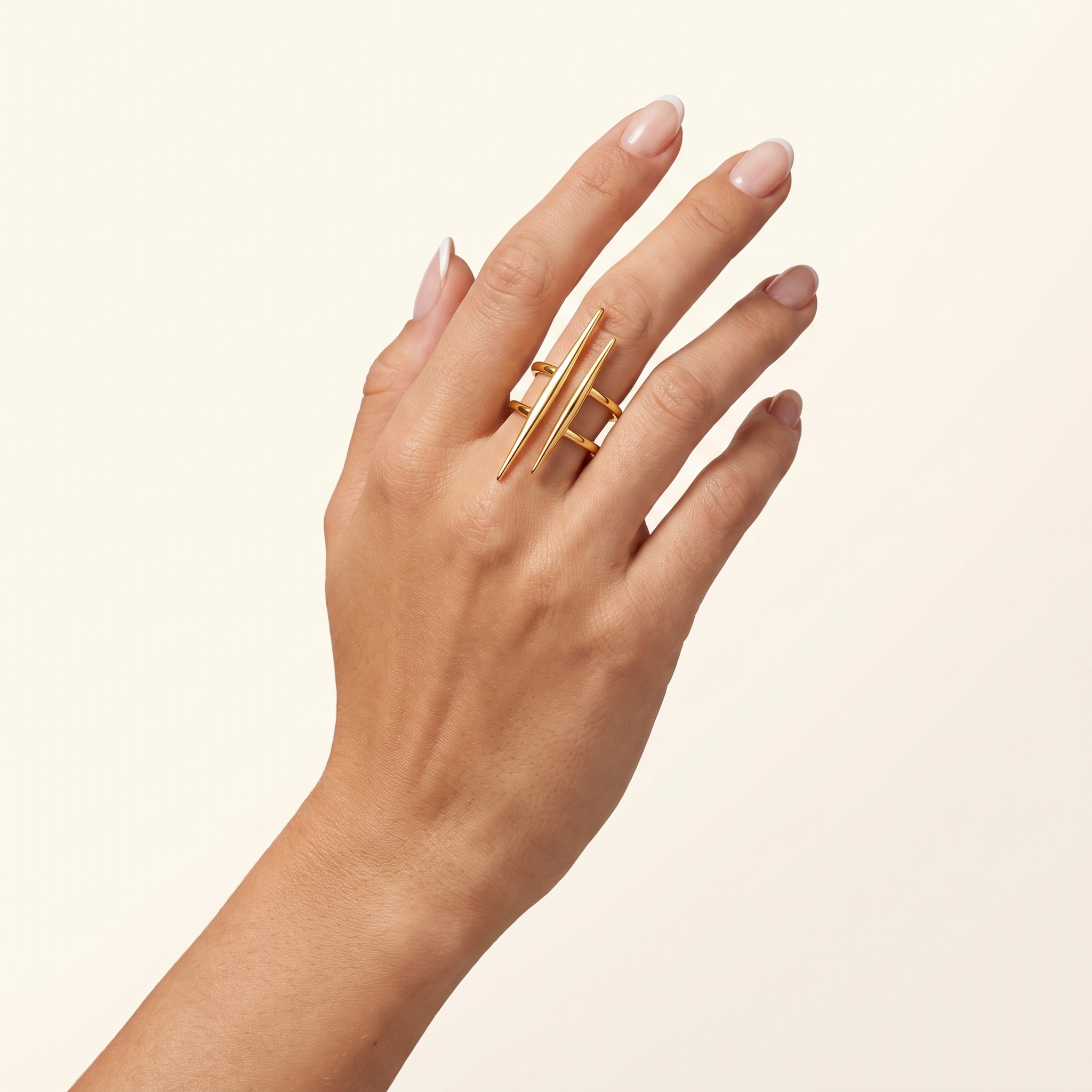 Woman wearing Sculpté adjustable gold ring in 18K PVD gold plated stainless steel with modern geometric statement design