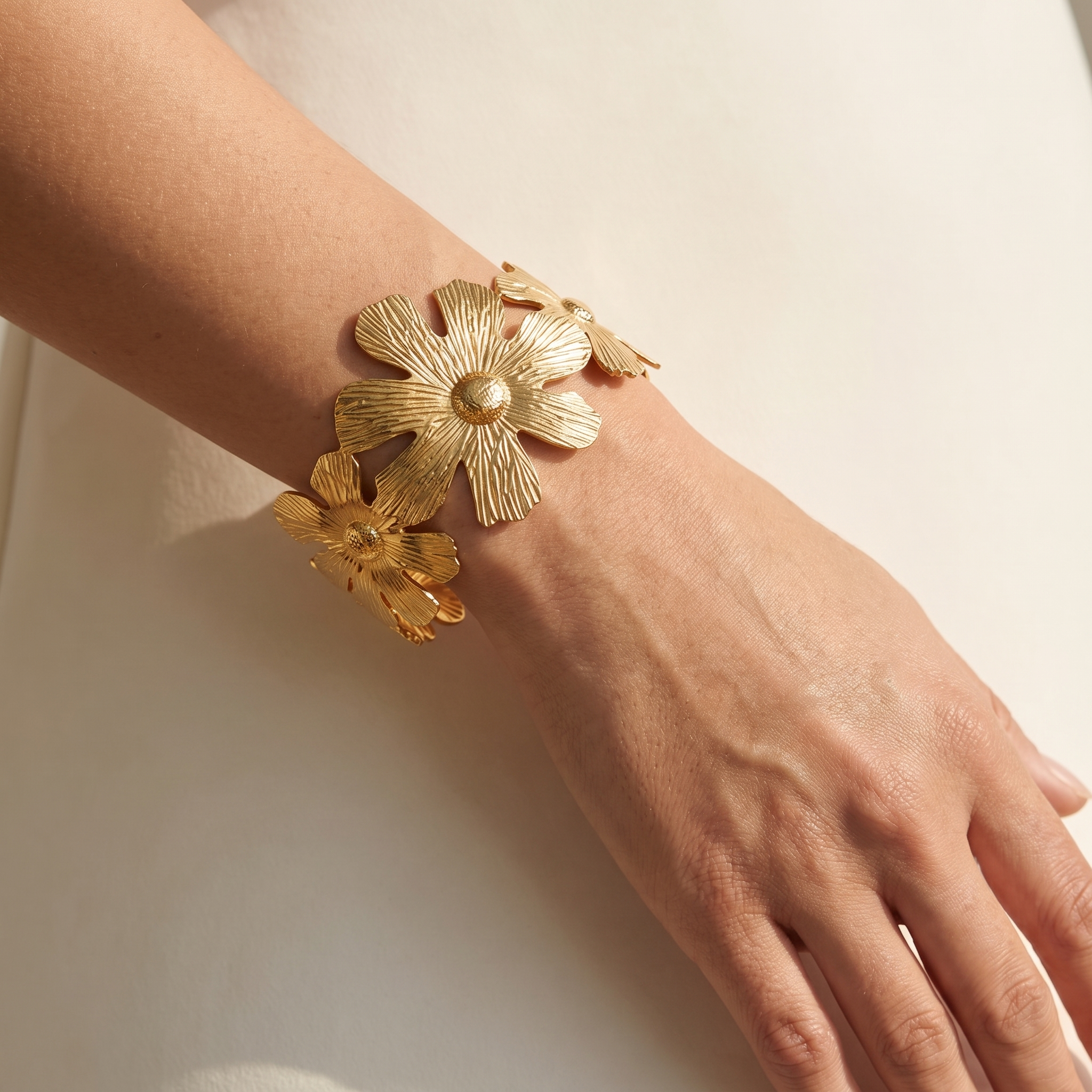 Close-Up of Gold Floral Cuff Bracelet on Wrist | Elegant Waterproof Gold Plated Jewellery by LAURRÈ