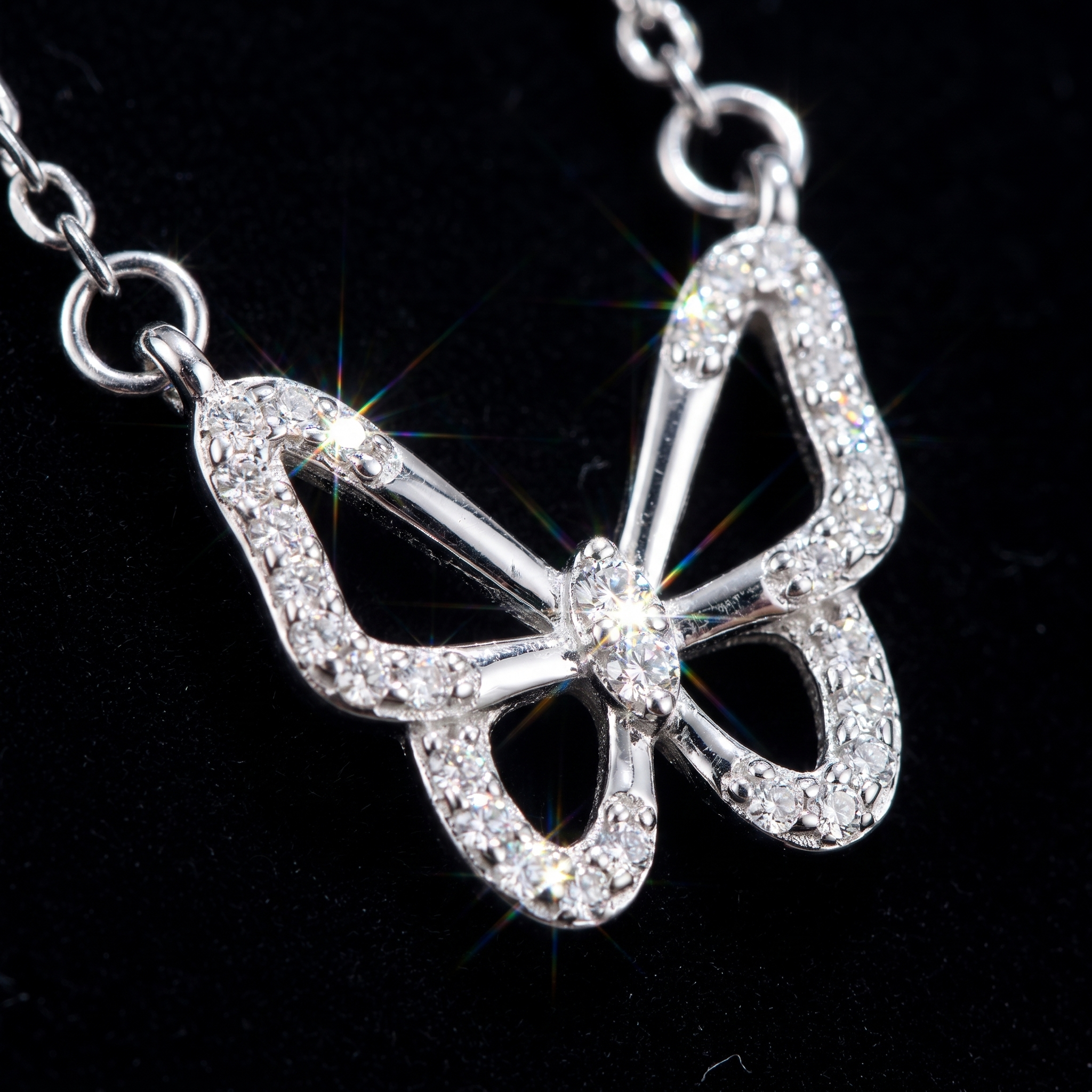 Close-up of butterfly pendant necklace in 925 sterling silver featuring brilliant AAA zirconia stones and fine craftsmanship