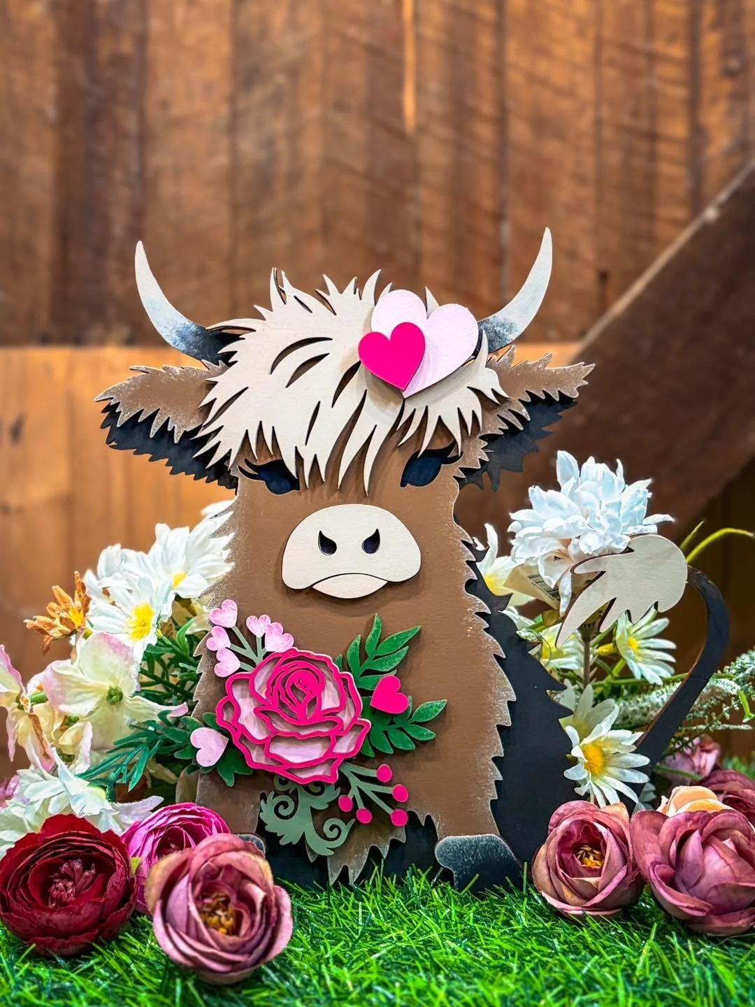 lady holding decoupaged pumpkin