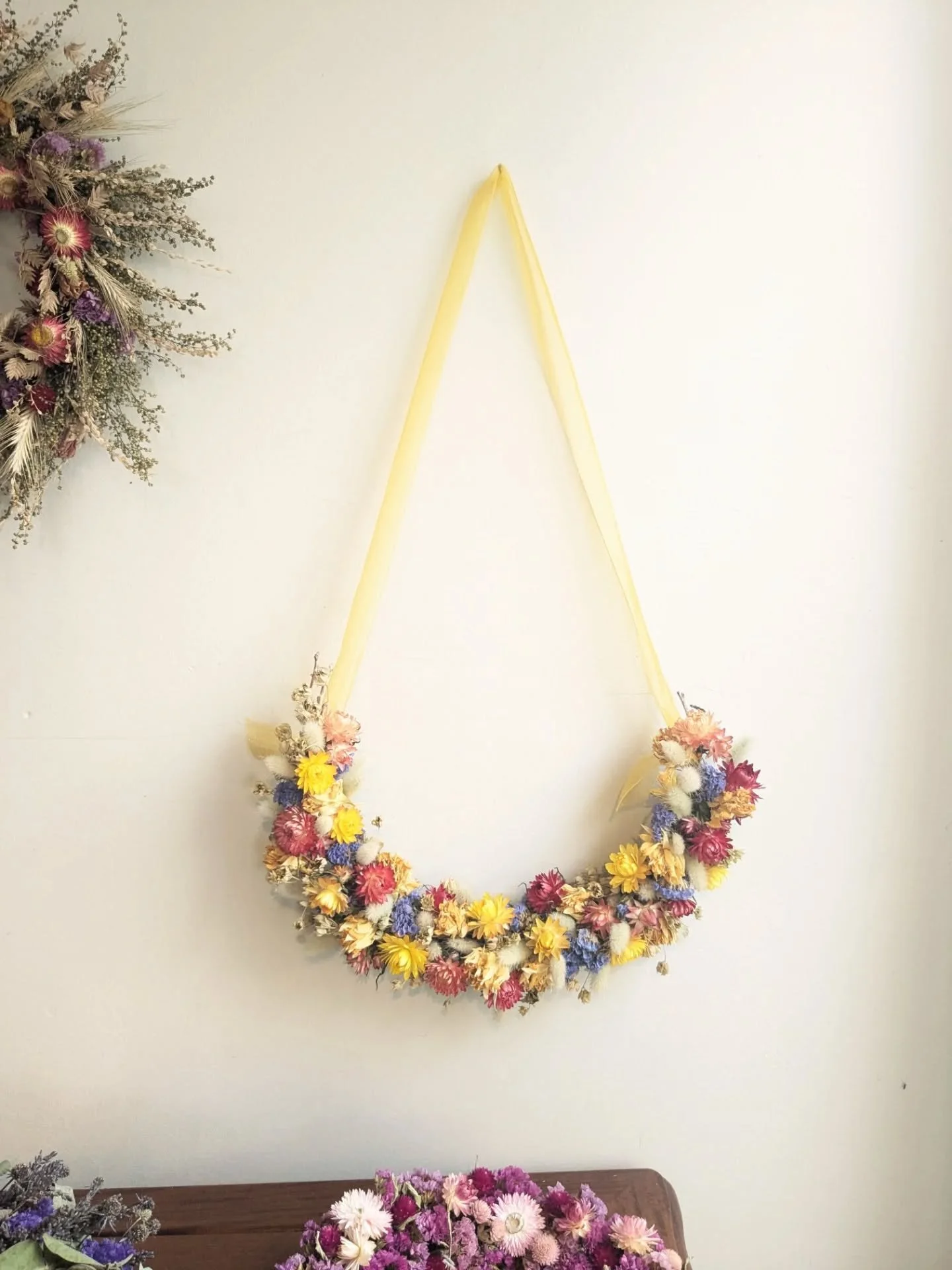 Friday wreath. It's been a grey and rainy week. The rain is welcome because the soil is still dry after summer's drought. The golden strawflowers in this are so bright, like the highlighter of dried flowers. 

In the breaks of rain we've been taking 