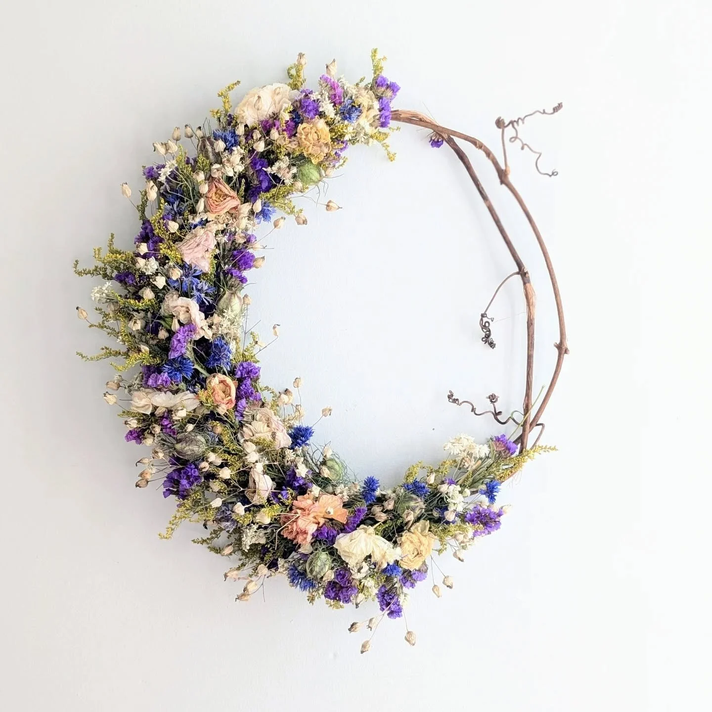 A few wreaths are left for ordering from this batch. If you like one and want more details, send me a message. 

The wholesale order I was working for while making these was saturated colors and pops of red. In response, these have no red, and are co