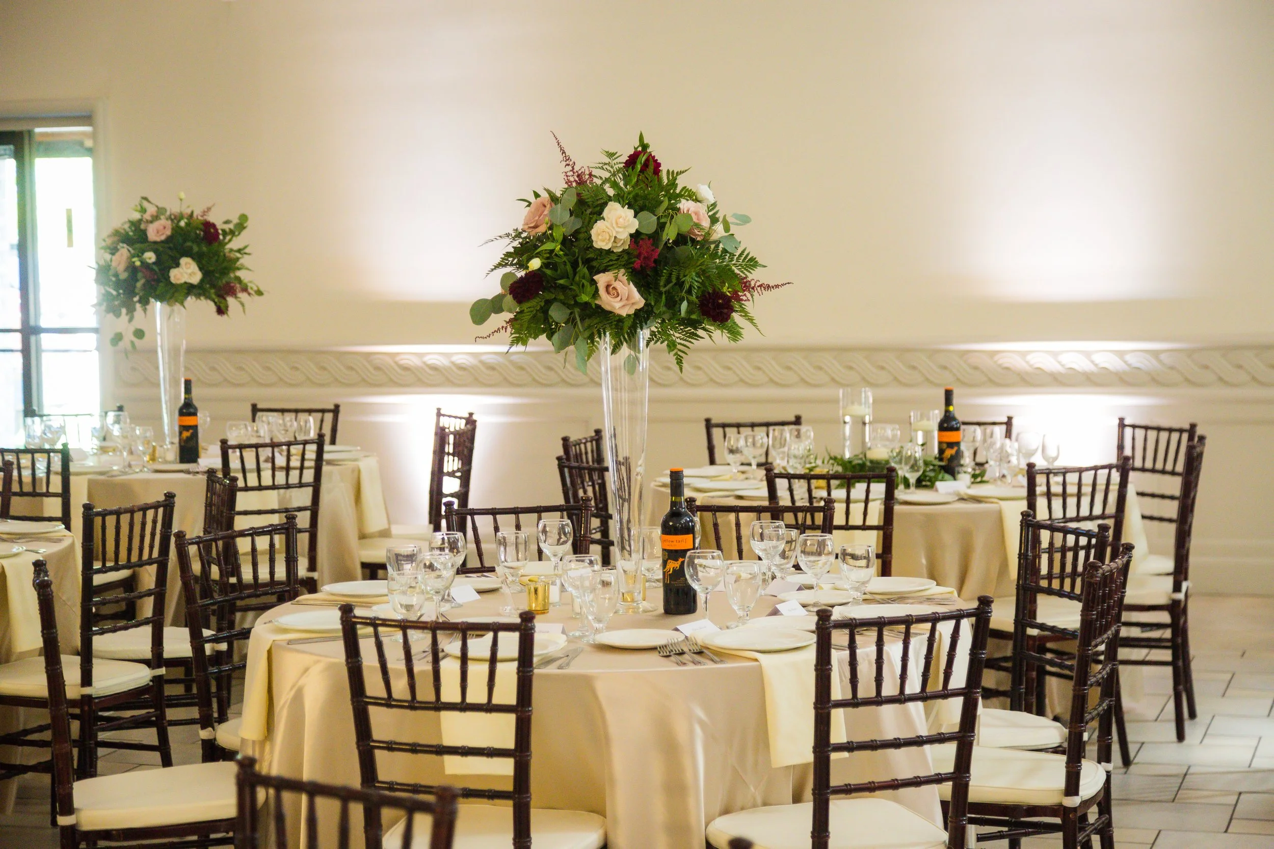 Elegant Wedding Decor in Champagnes and Burgundy