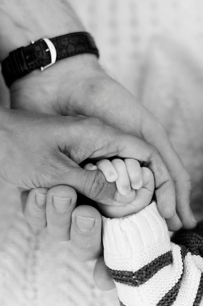 Tiny detail of newborn hand during a newborn photography session in Loveland, Colorado.