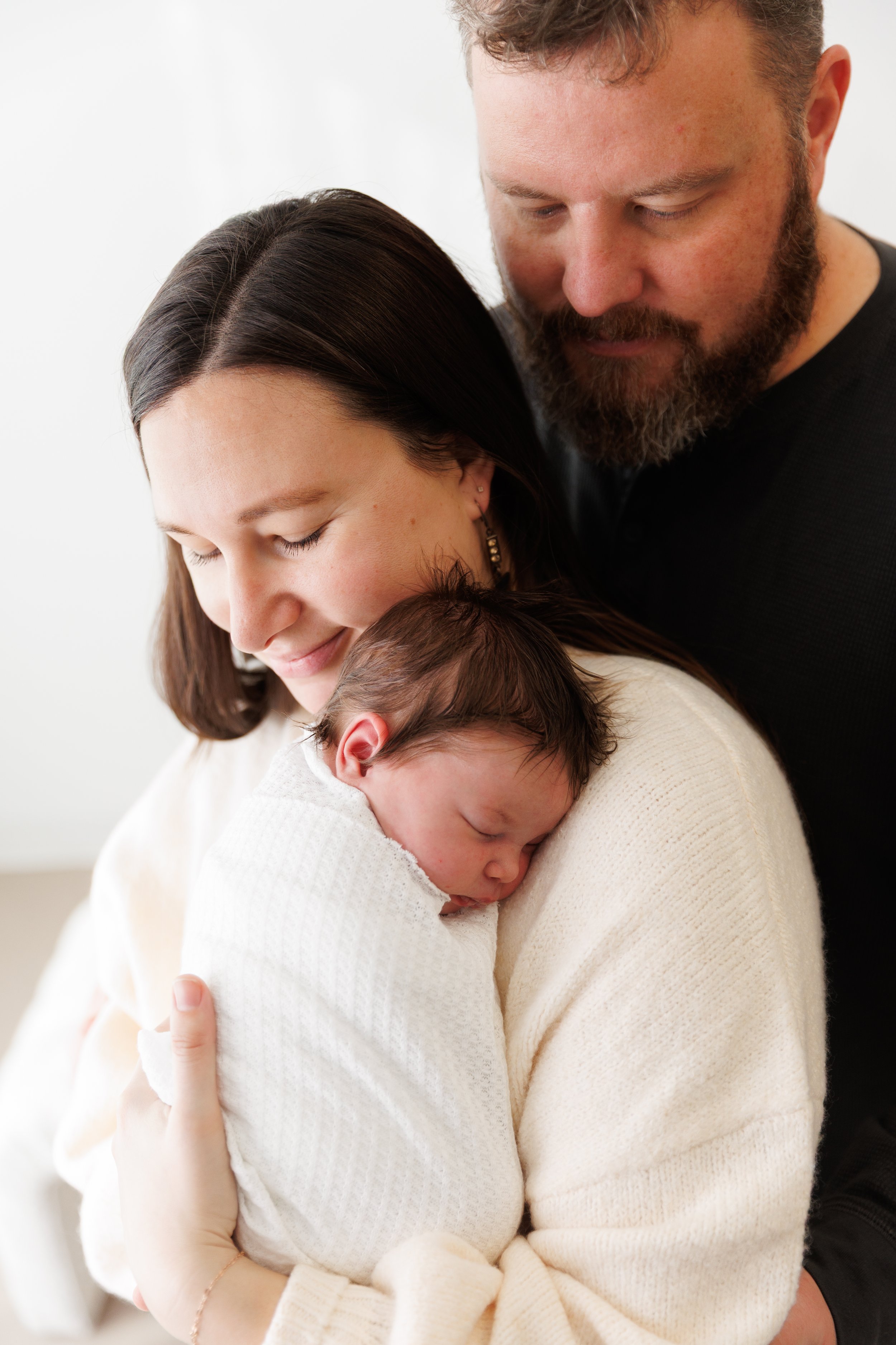 Family portrait during a studio newborn session in Loveland, CO