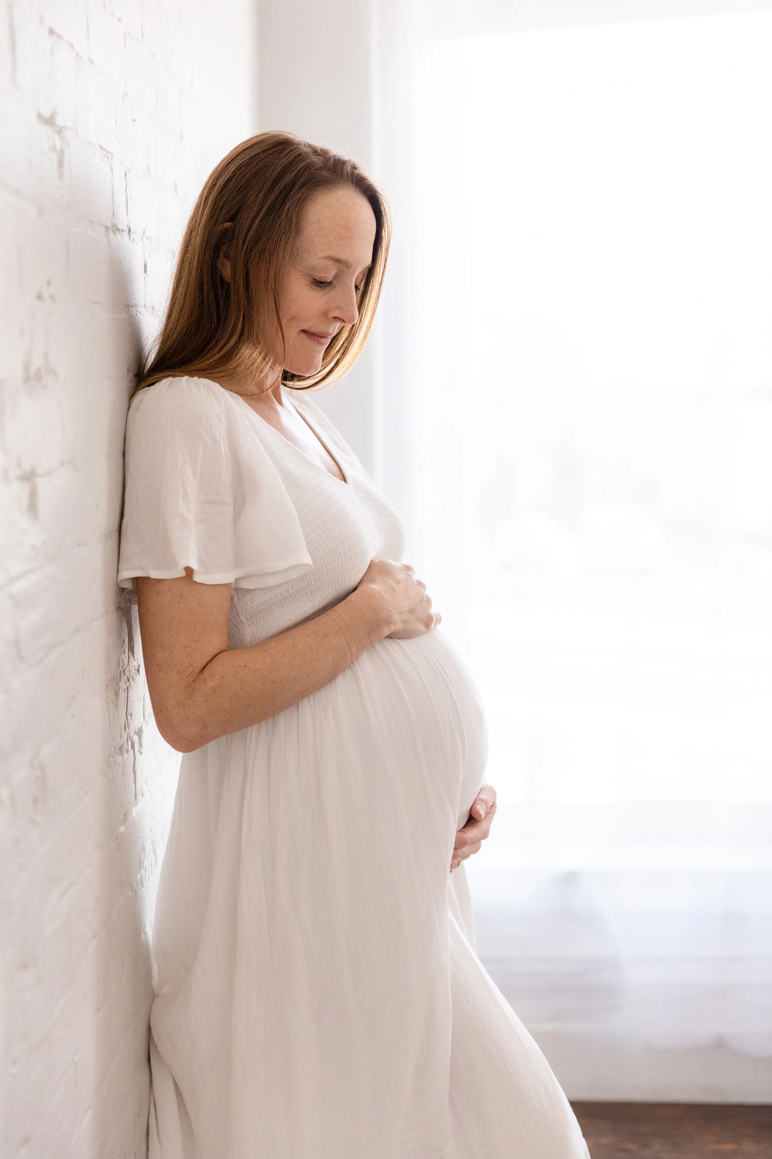 Maternity portrait during a studio maternity photography session in Fort Collins, CO.
