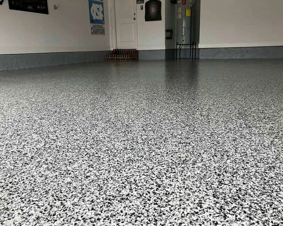 DPL Coatings team performing Expory Flooring in Garage in Hope Island, Gold Coast