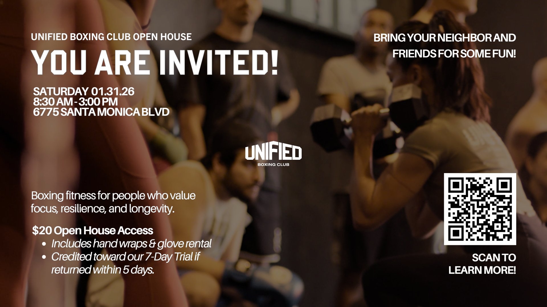 A group of people at a boxing gym, with one person lifting dumbbells and others sitting or standing nearby, engaging in a fitness activity.