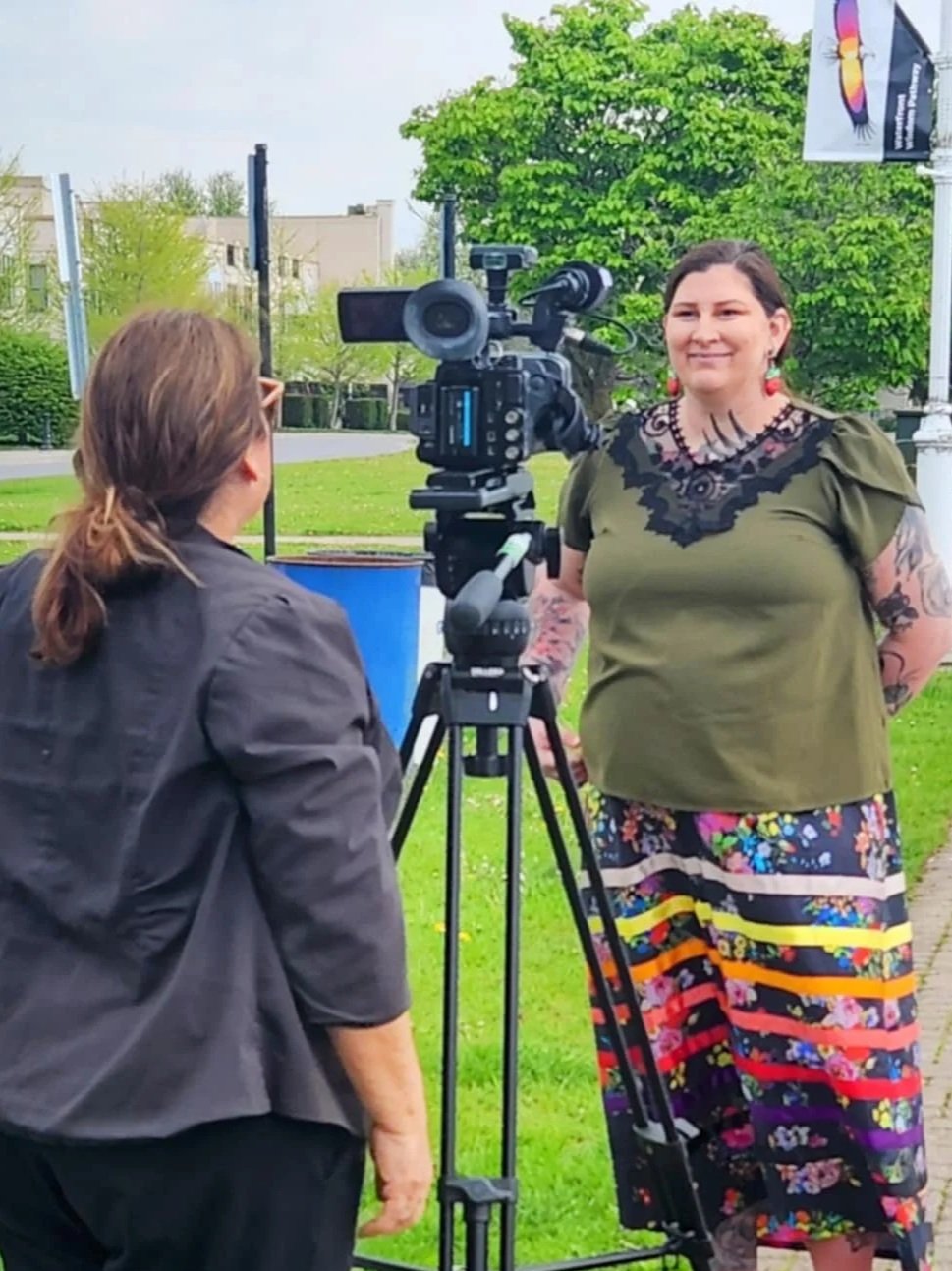 Cobourg Waterfront Wisdom Pathway collaboration with Rick Beaver for an interactive art walk. I am 6 months pregnant with my daughter, and seen here being interviewed by Annette Francis of APTN May 2024