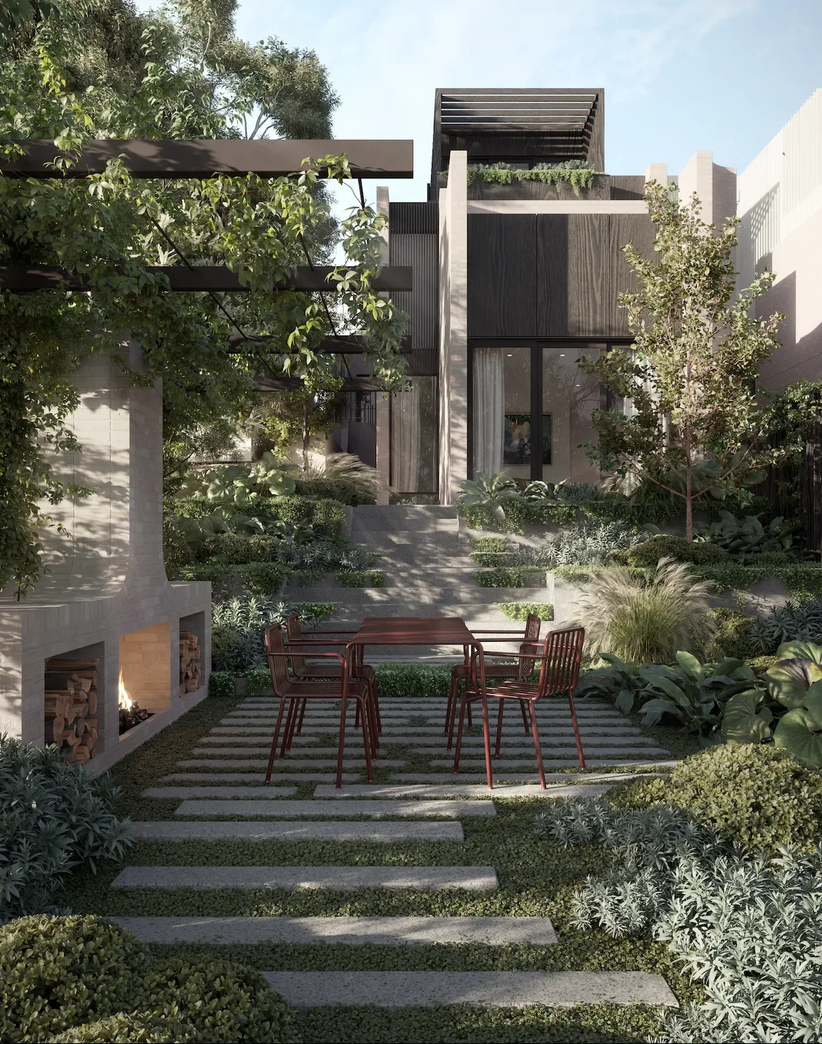 EHA Clarke St Terrace garden with brick fireplace looking back to 3 storey terrace