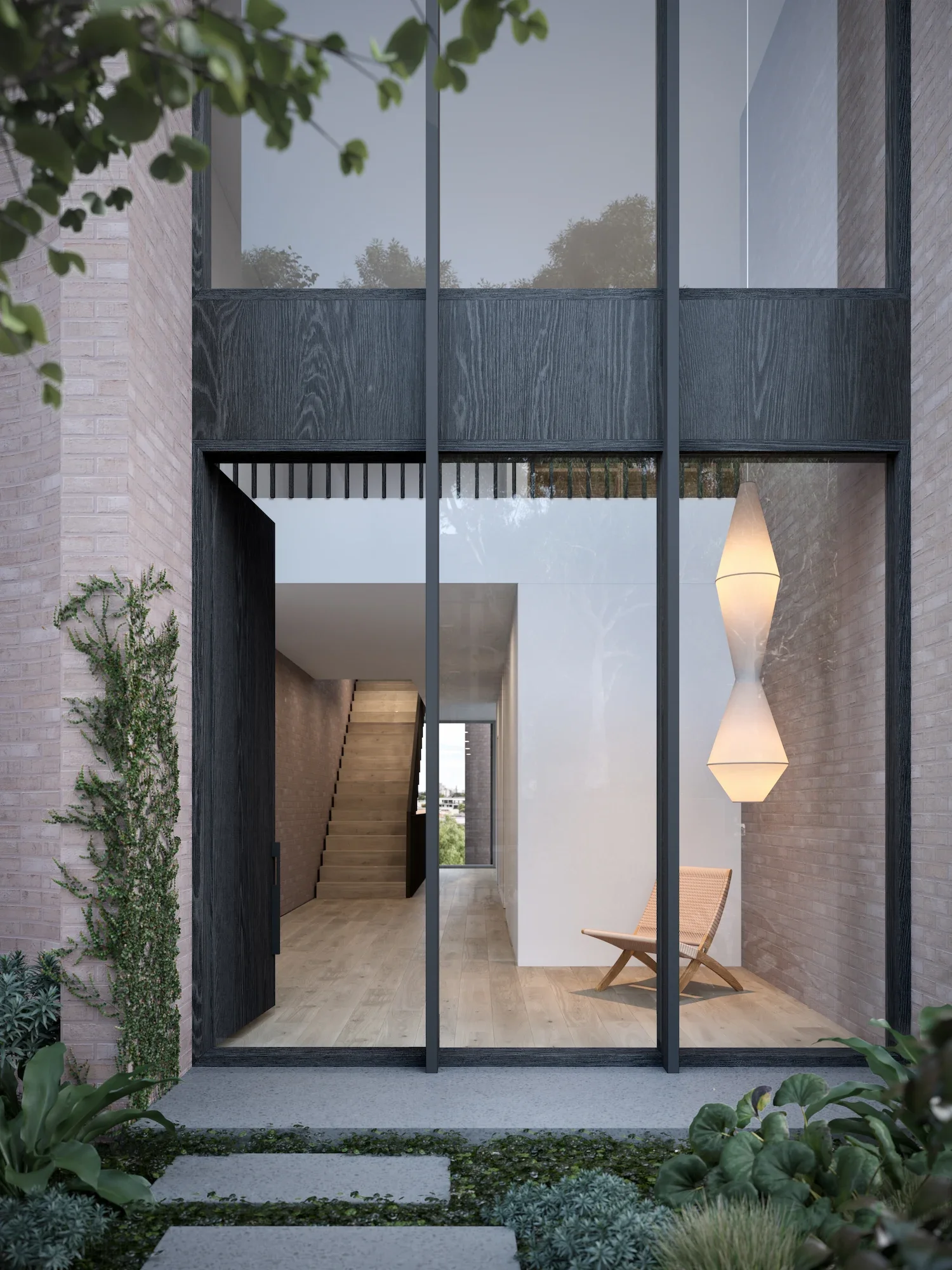 EHA Clarke St Terrace dark house entry with double height void and view beyond