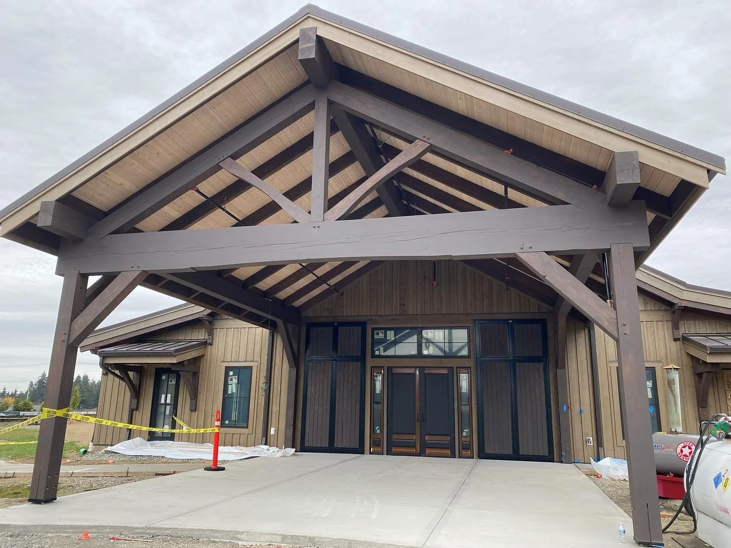 Concrete! We are so happy to be at this stage. Our grounds and parking area will have plenty of paved surfaces. Year round use and providing clean and safe surfaces during rainy times was a must for us!