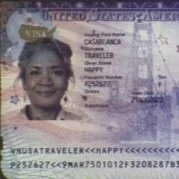 Traveler's passport page showing a passport photo of a woman, passport details, and a visa stamp.