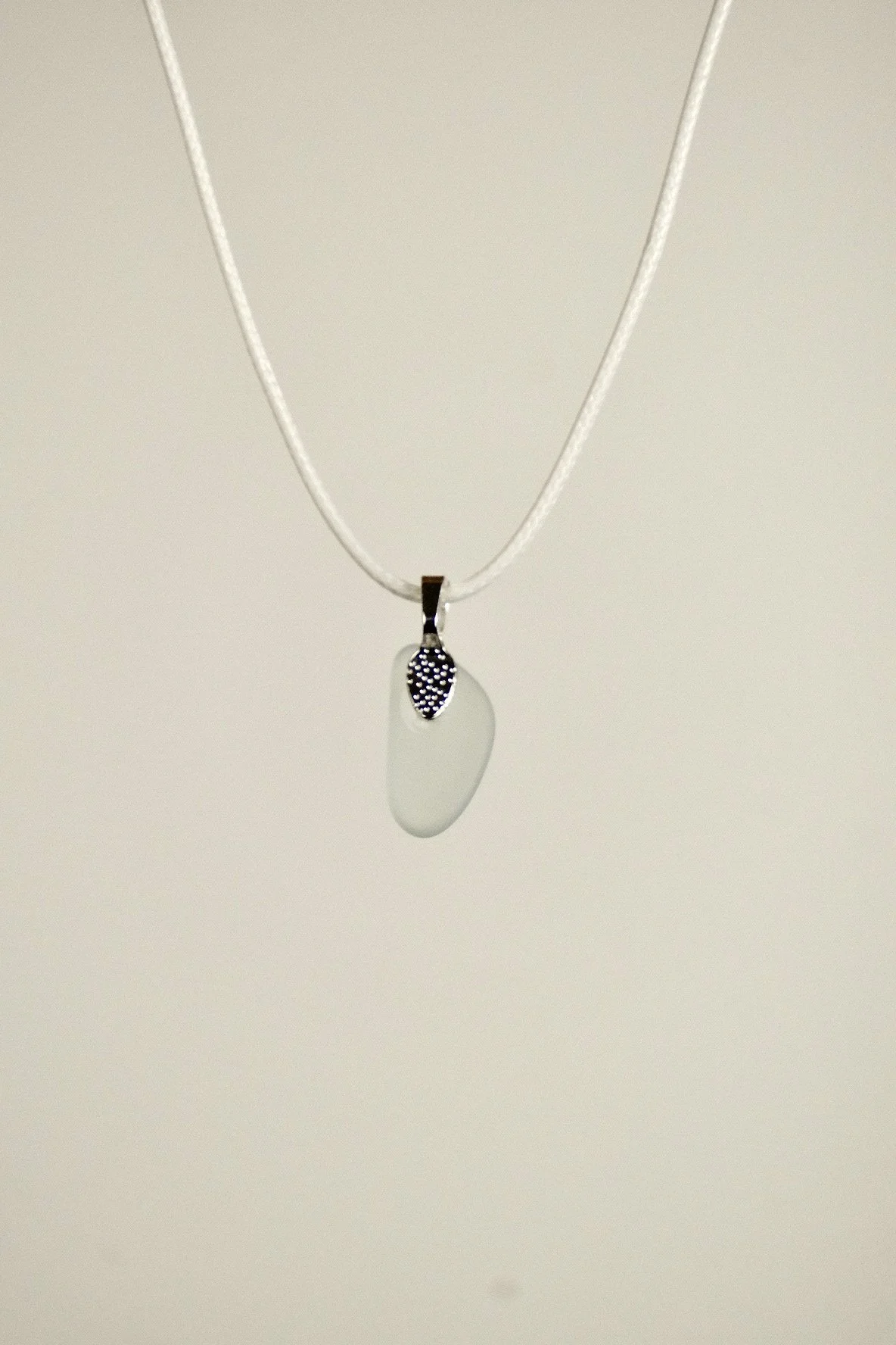 image of a hand crafted white sea glass necklace