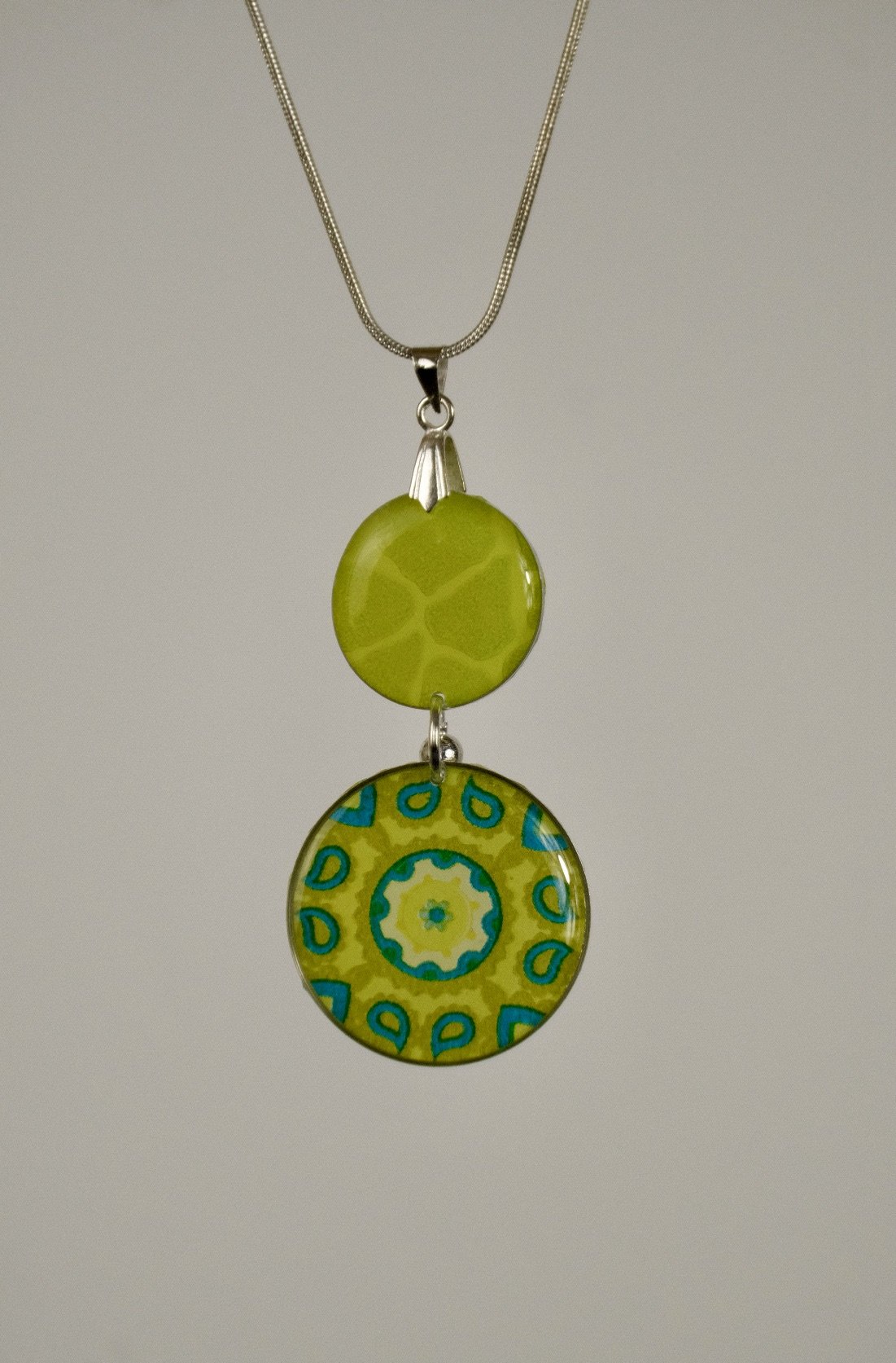 indigo roc mandala lime resin necklace