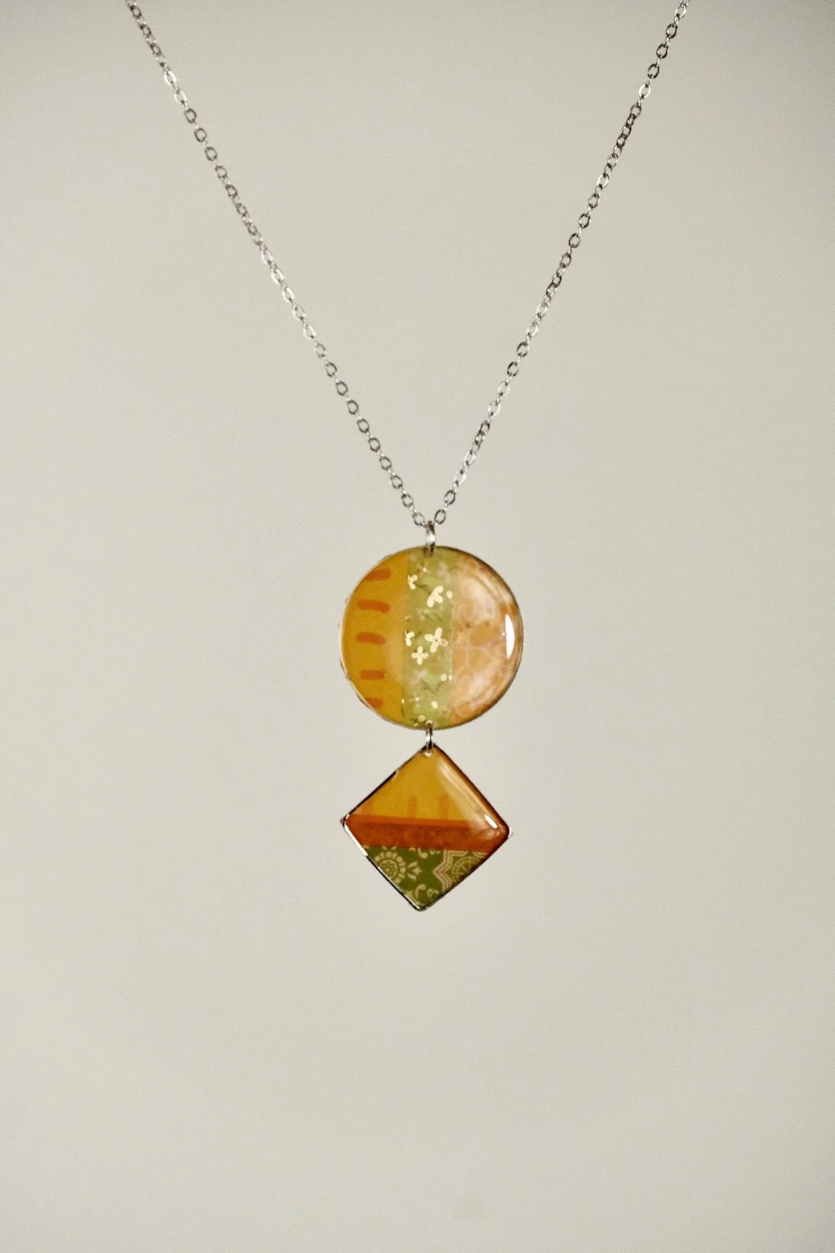 indigo roc lime and orange resin necklace