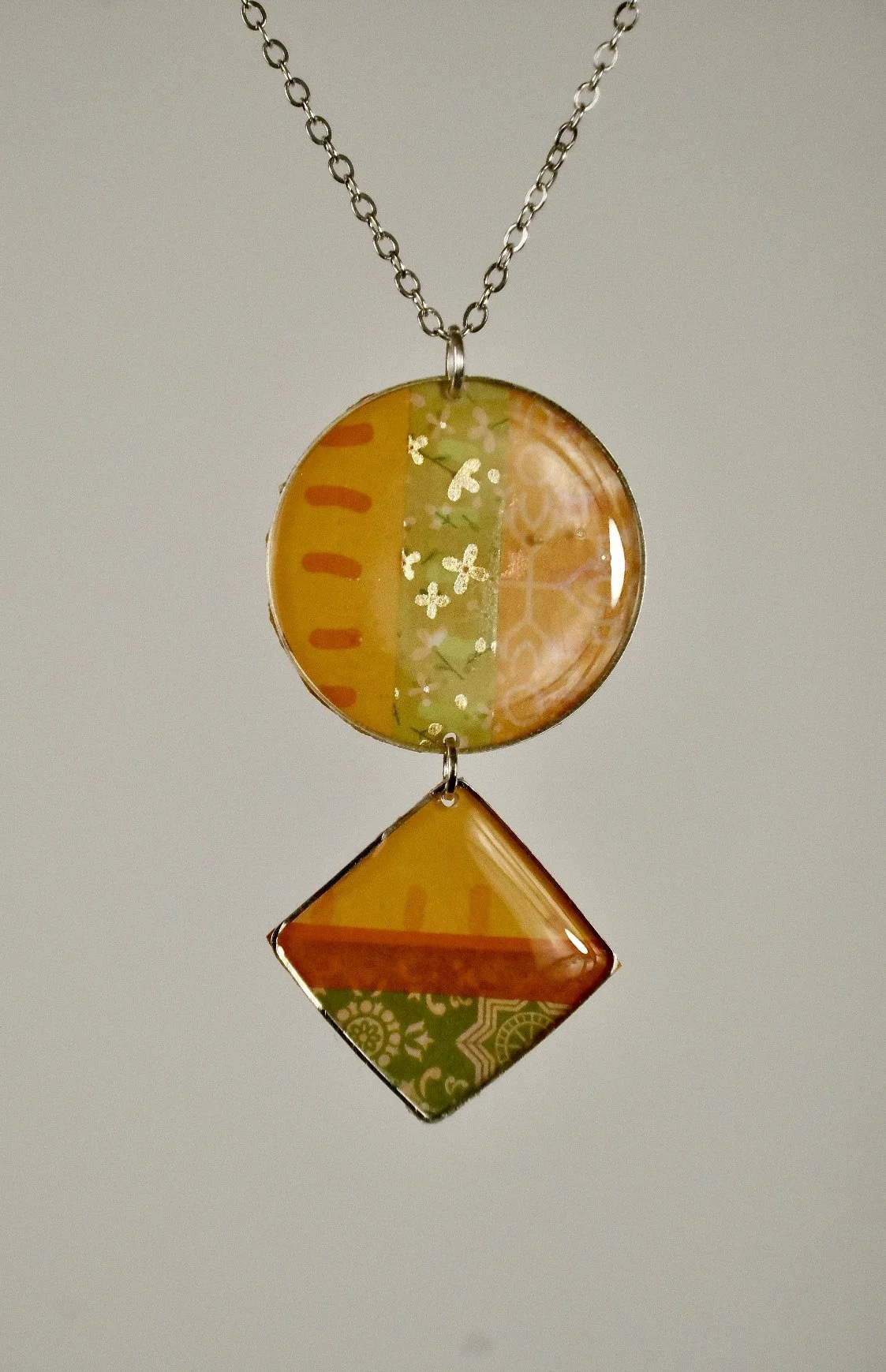 indigo roc lime and orange resin necklace