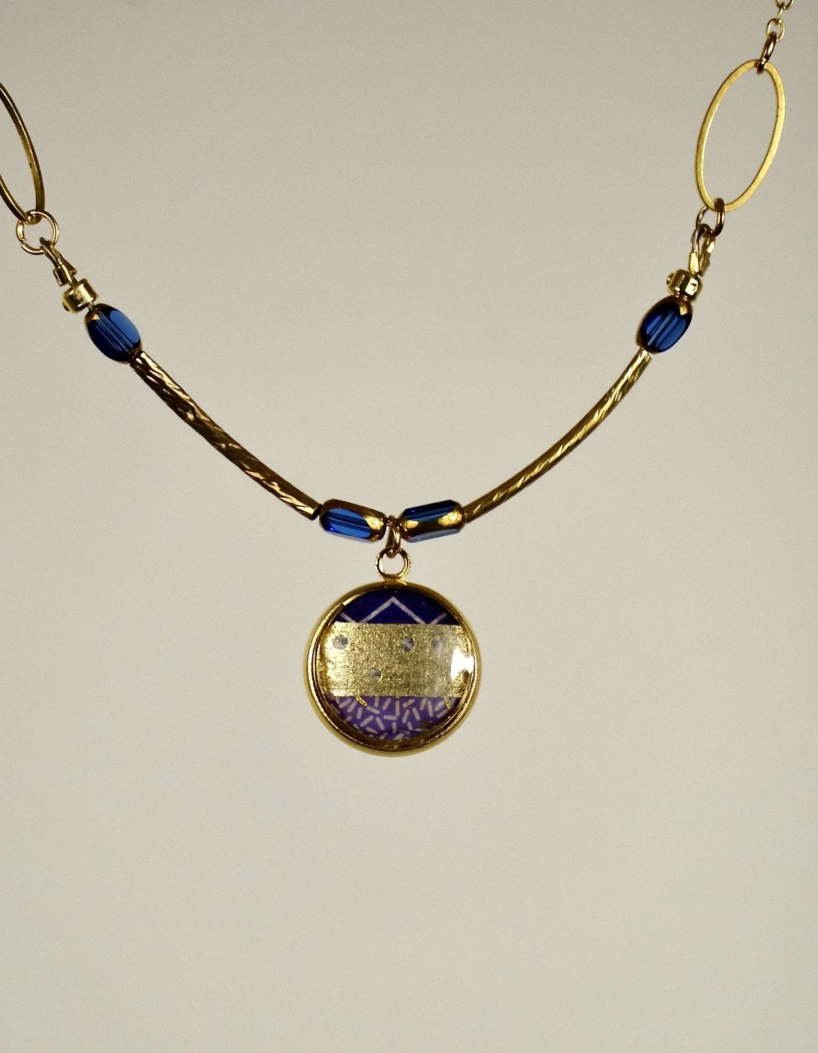 blue and gold resin choker