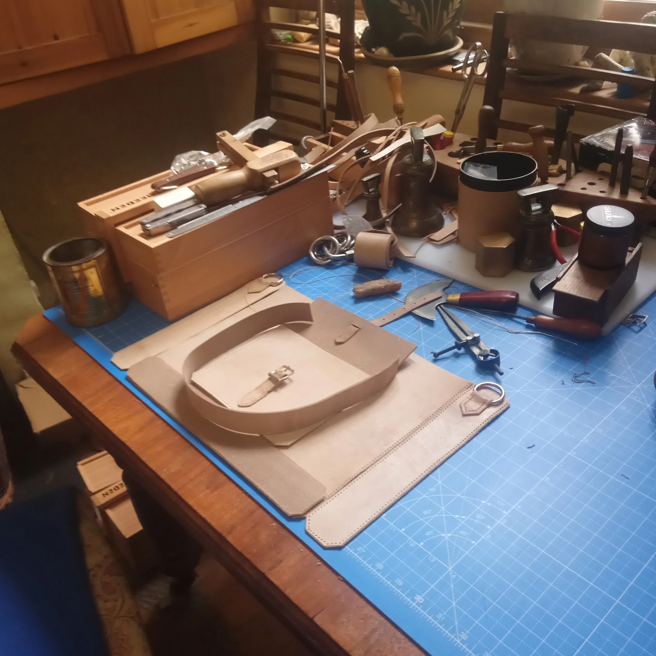 Leather Satchel cut and ready  to sew with traditional leather working tools, at rosie and red art and leather studio gallery and workshop, primary and key providers of classes and gallery events in bideford.jpg