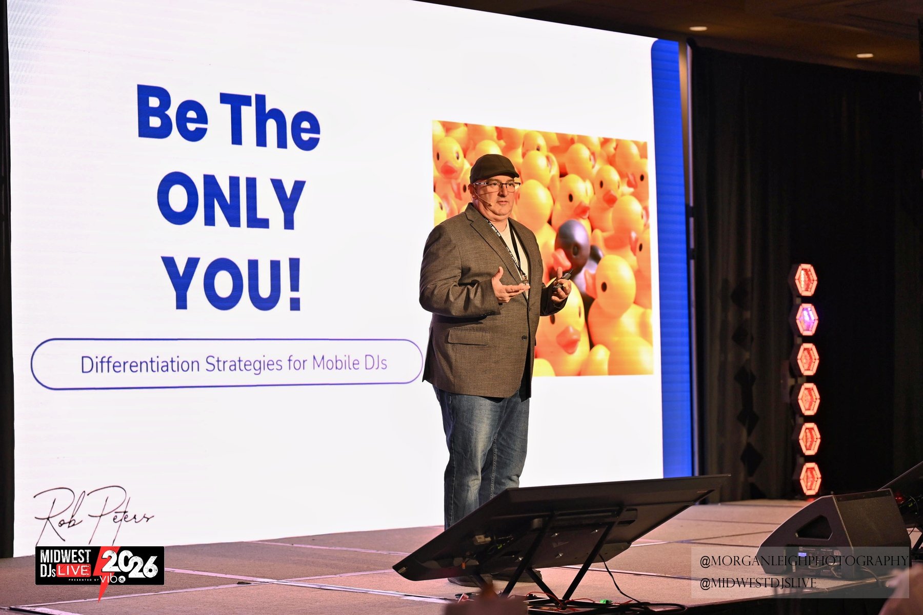 Rob Peters presenting Be The ONLY You on stage.