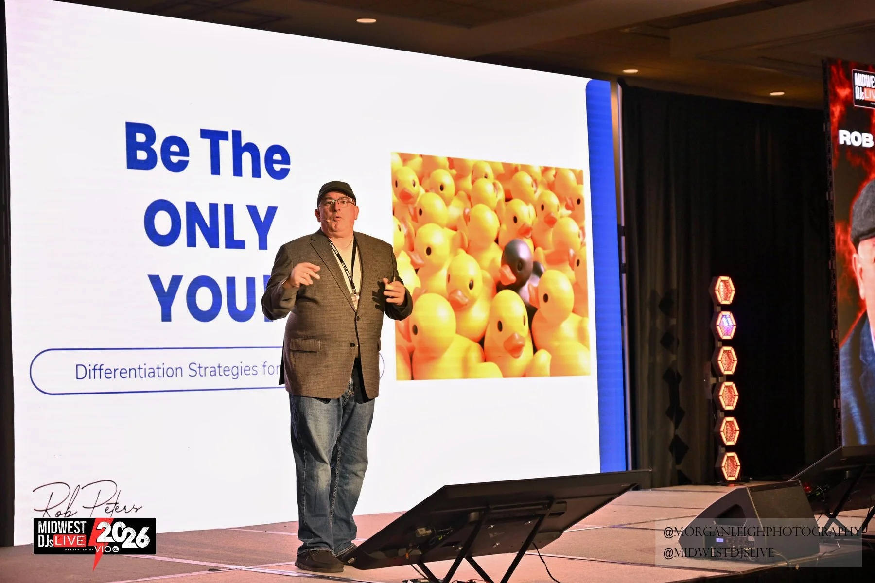 Rob Peters presenting Be The ONLY You on stage.