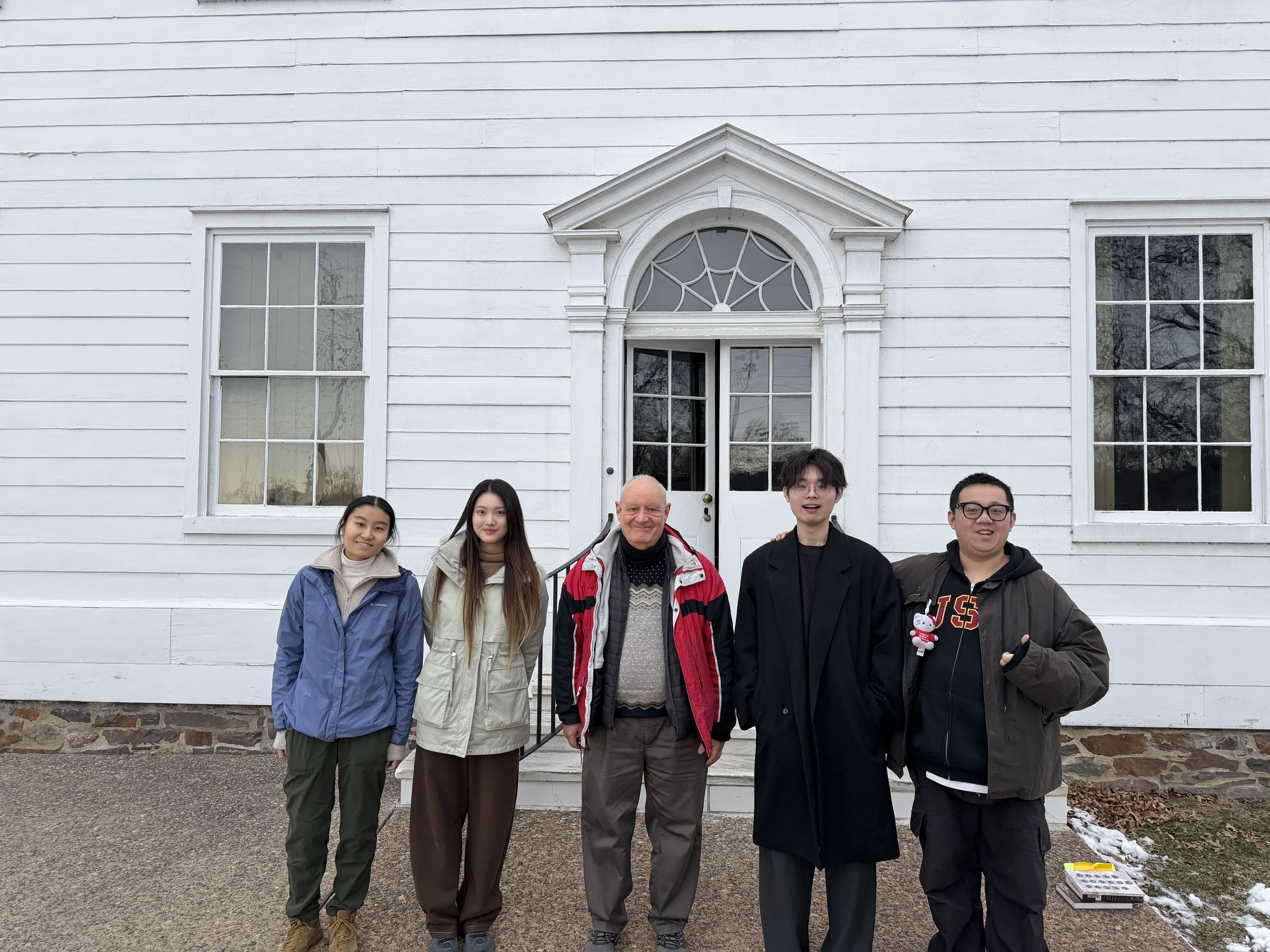 GhAIst team members are standing in front of Joseph Priestley’s historic home alongside an expert on Priestley’s history.