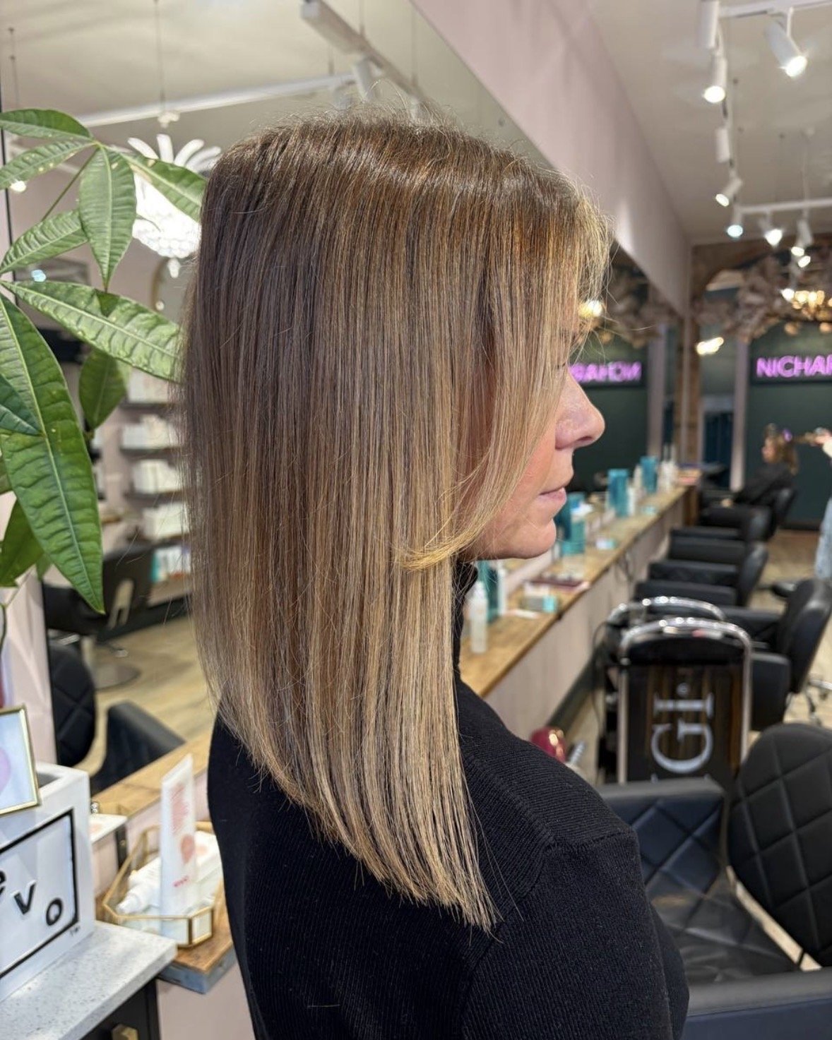 Natural-looking hair transformation adding healthy thickness and movement with premium tape-in extensions at Nichares Taunton.