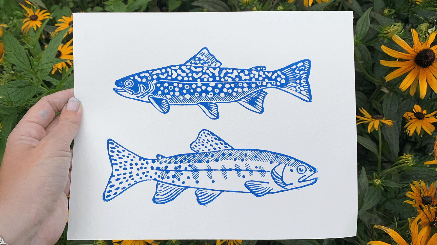 Block print of a trout - for art and science event exploring how ecosystems are affected by fire