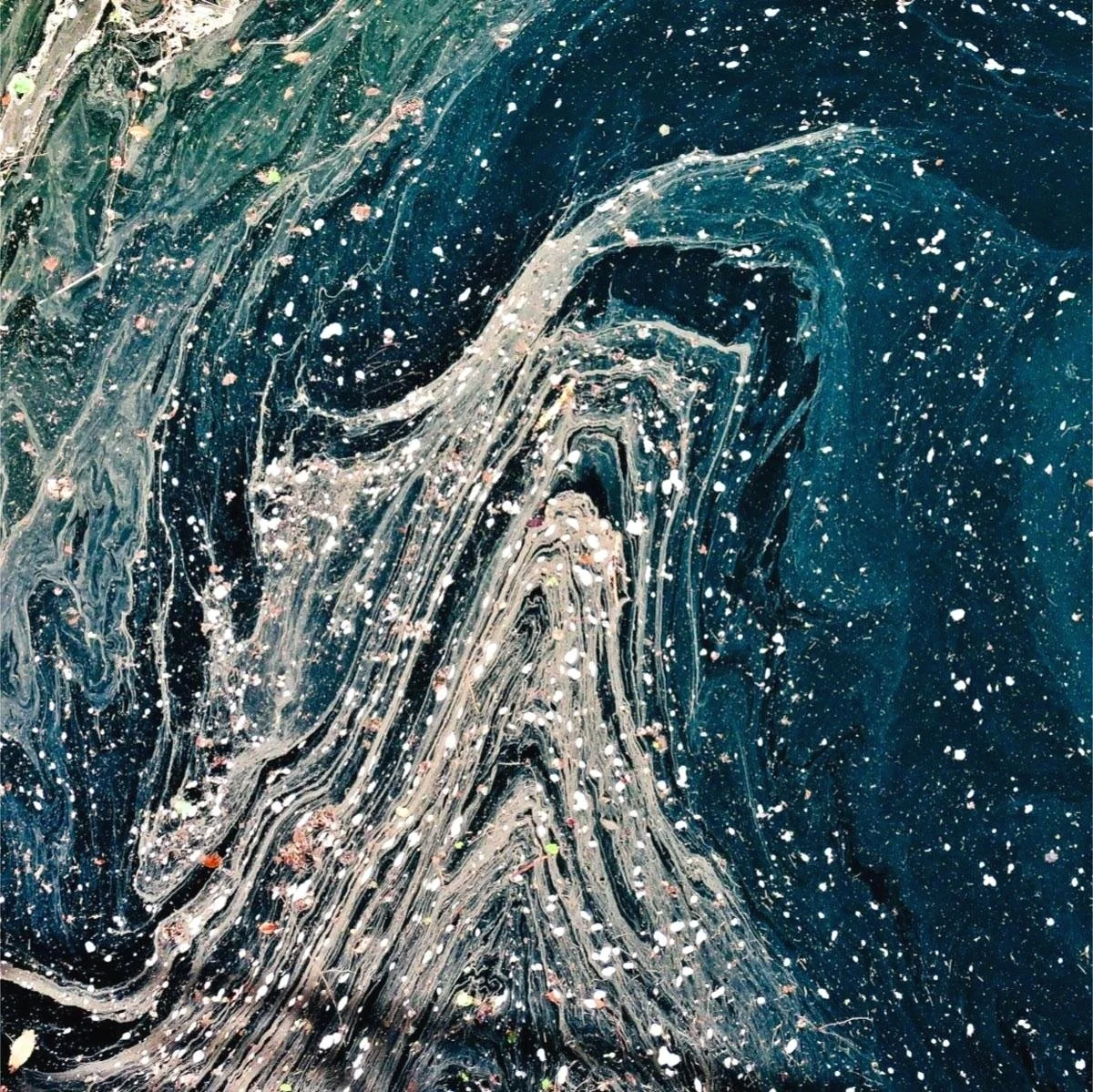 blue and white abstract art that looks like water