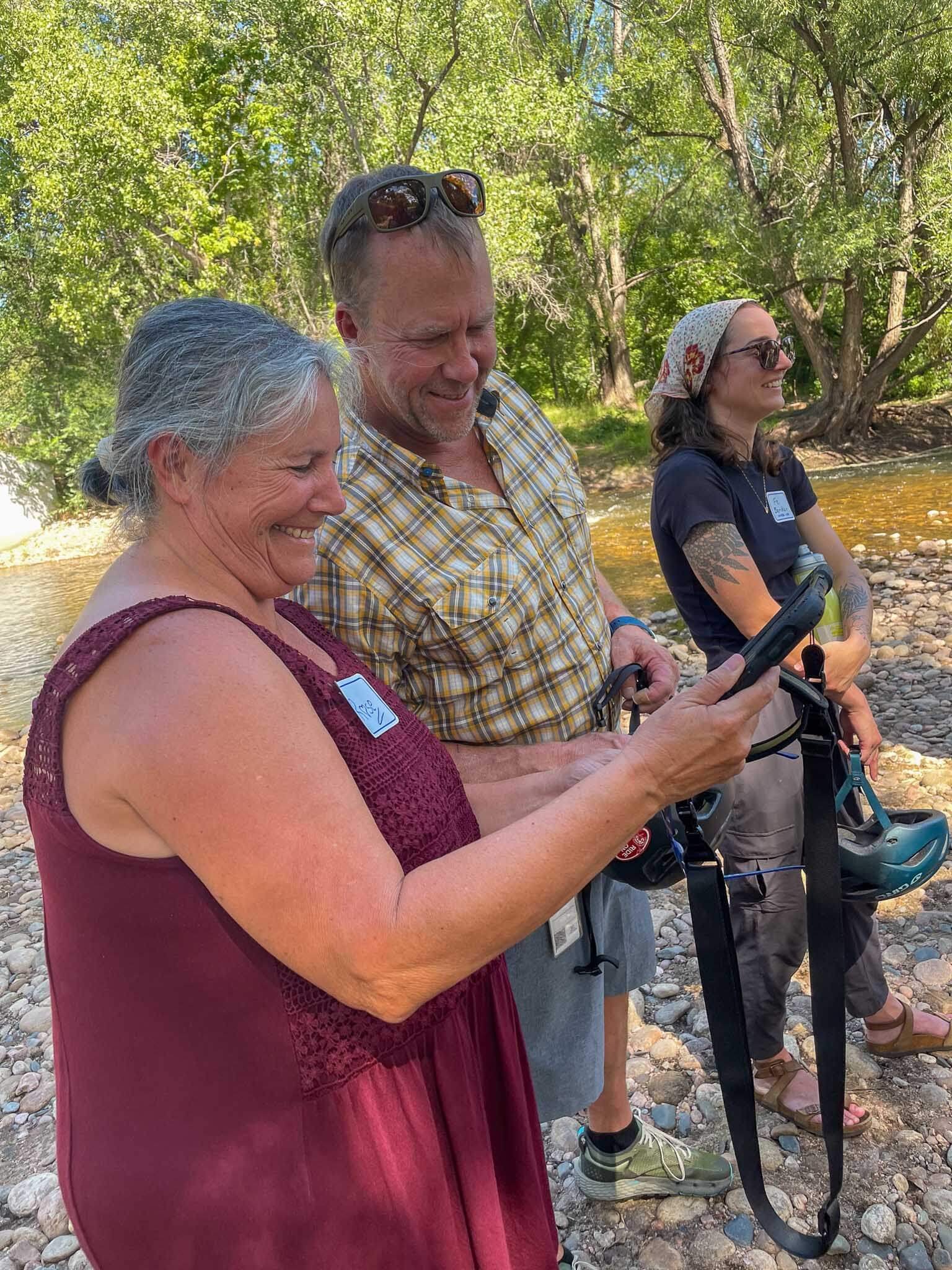 bike riders looking at water quality data