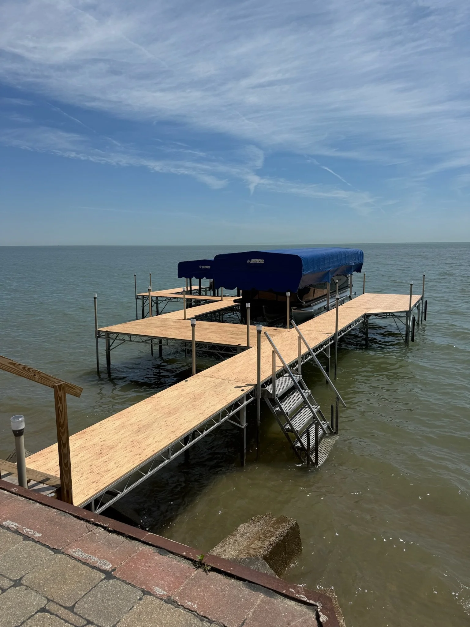 Aluminum Dock install with a boat and jet ski lift on Lake Erie