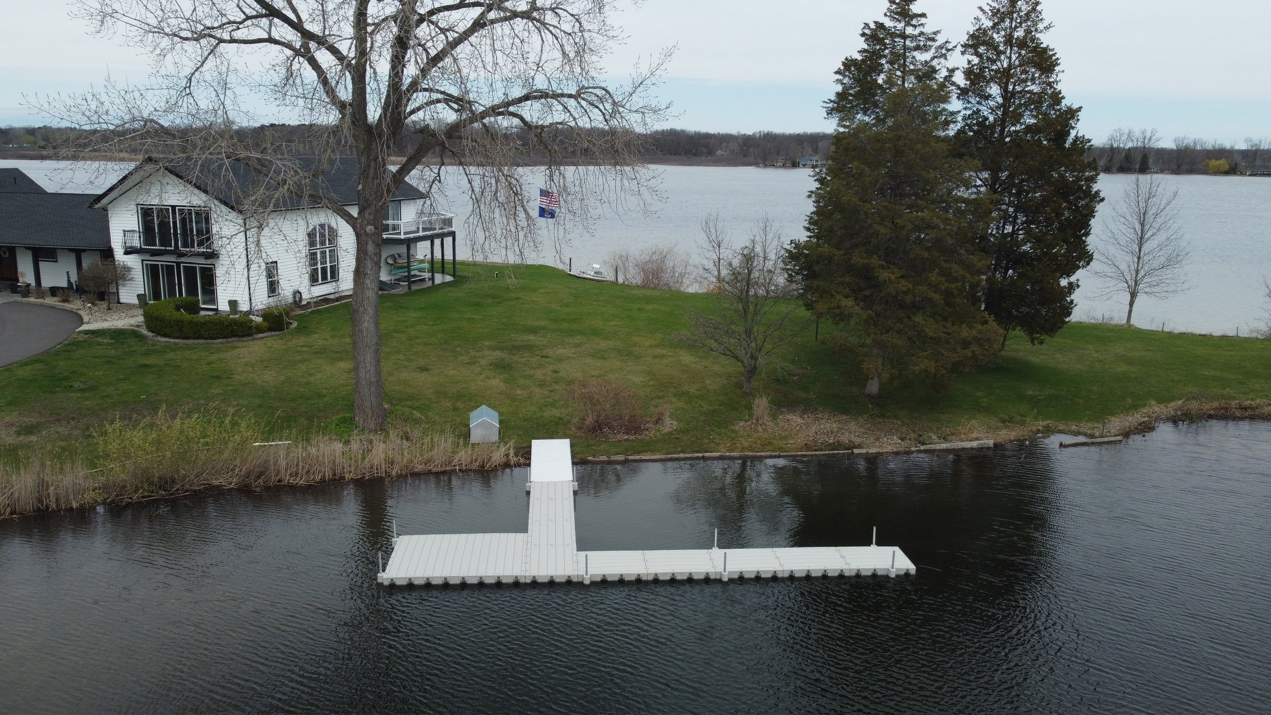 10 sections of floating dock, with an aluminum dock entry platform 