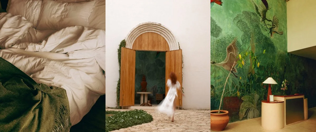 Hotel interior at BACAB in La Veleta, Tulum featuring a bed, wooden entrance door, and mural at the reception