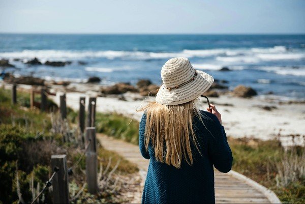 Woman looking out over the ocean